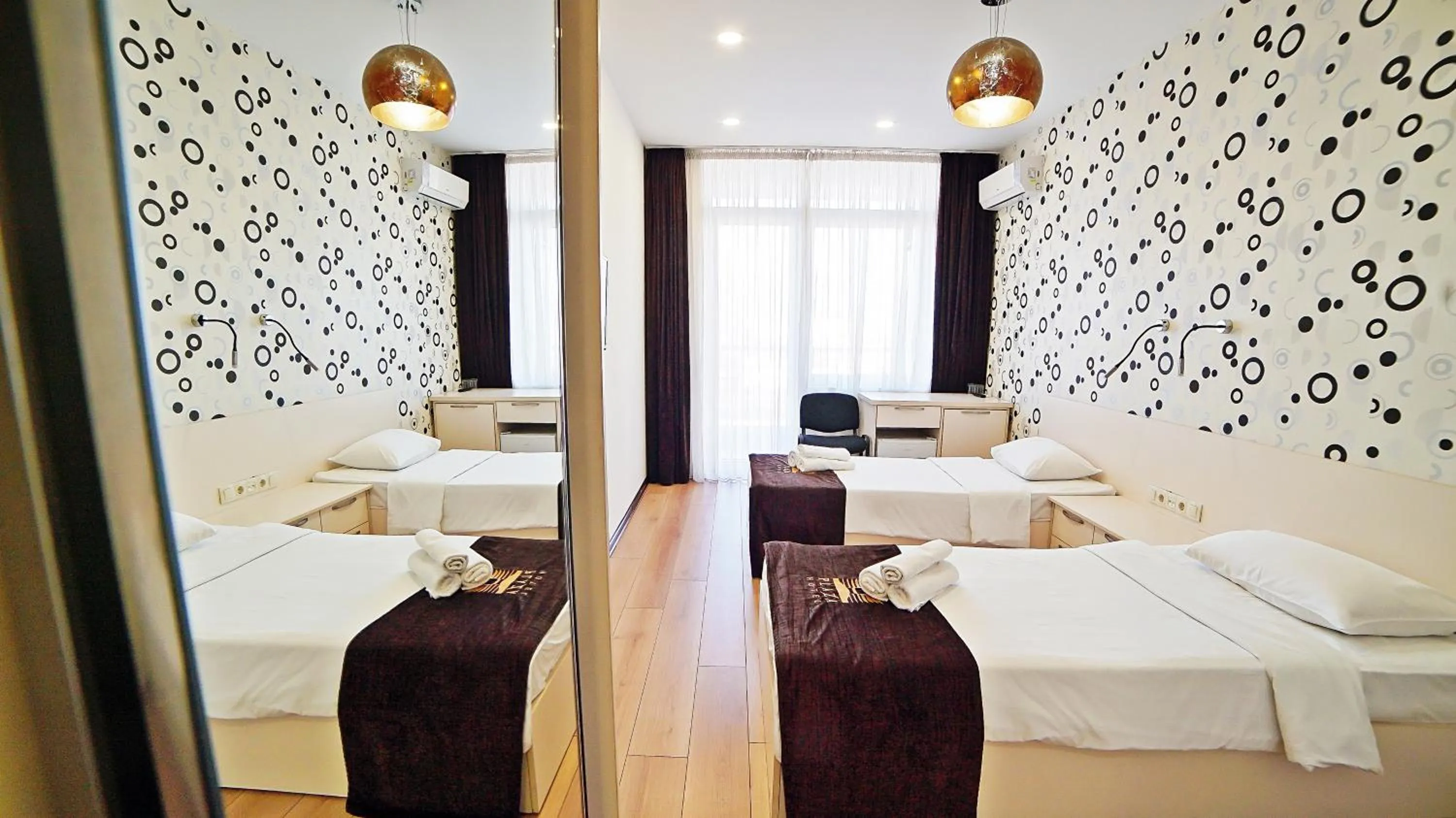 Bed in Mardi Plaza Hotel