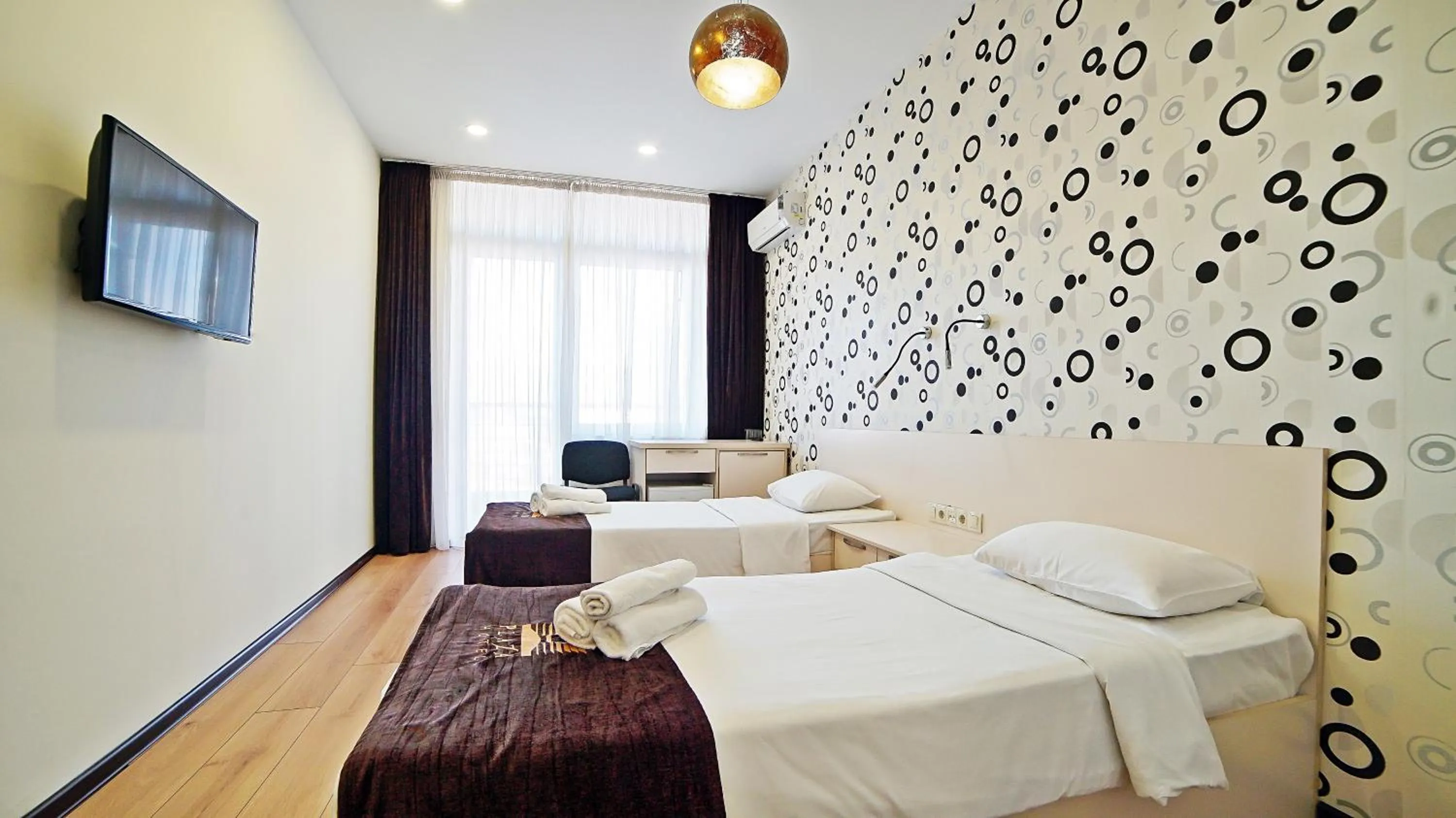 Bed in Mardi Plaza Hotel