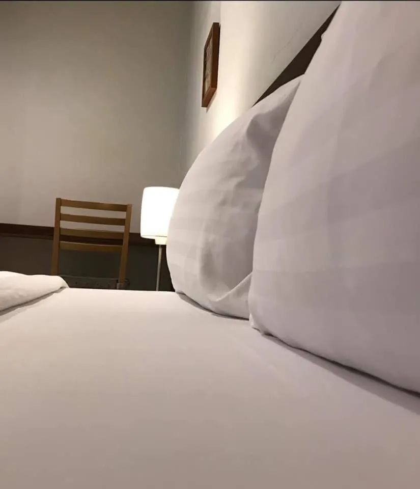 Bed in Mango Bedroom Inn