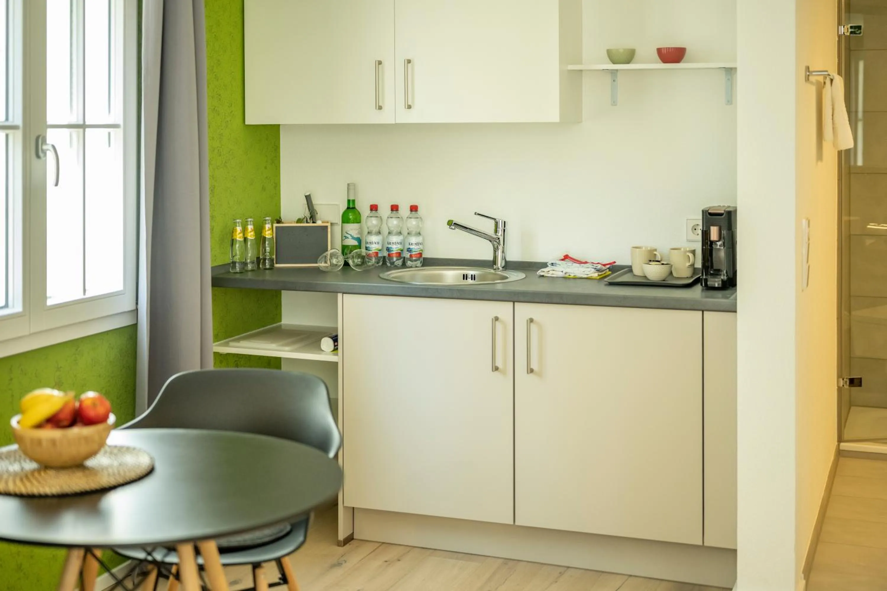 Kitchen or kitchenette in Gästehaus am Schlossplatz, Z. 4