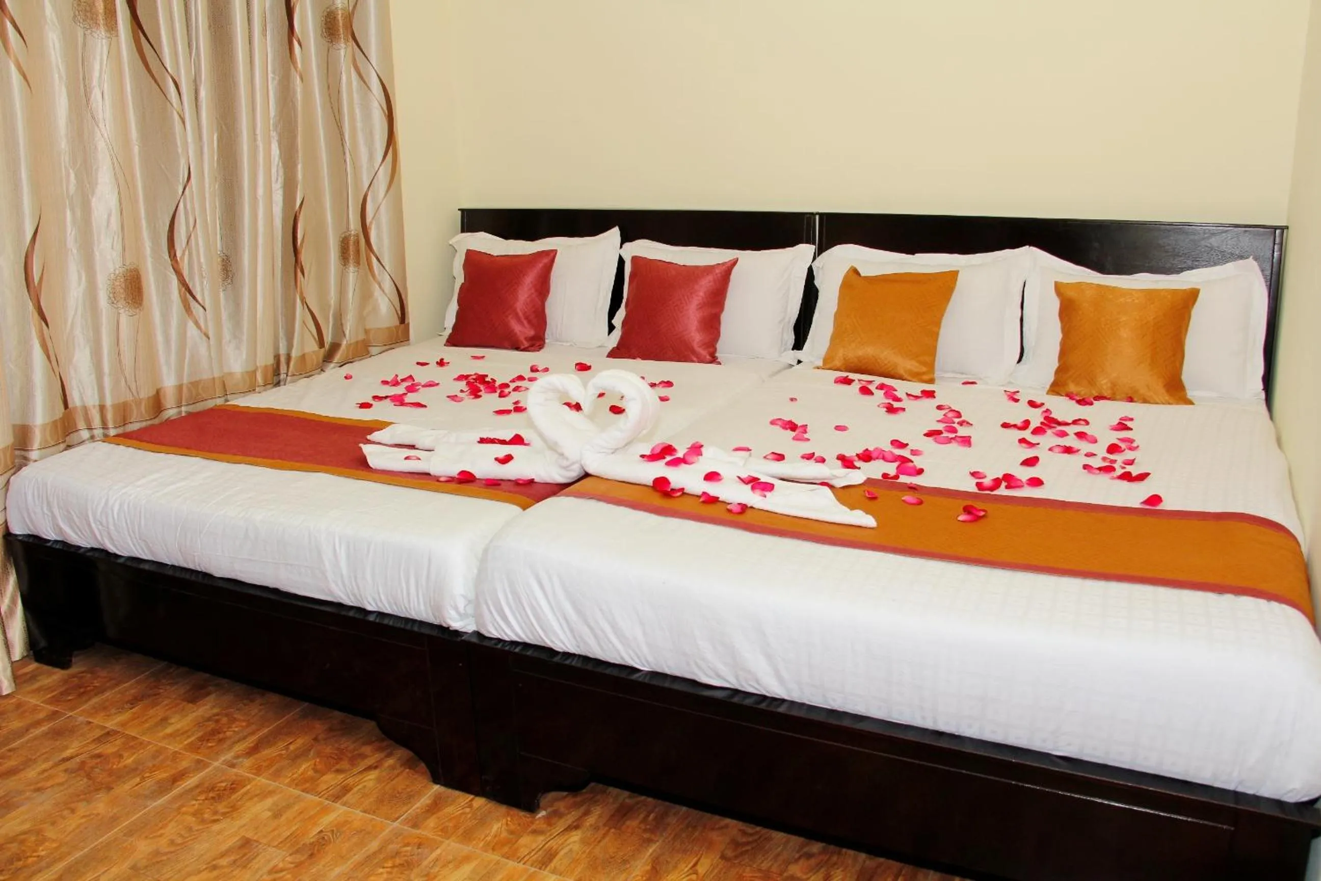 Bed in Sun & Sands Beach Hotel