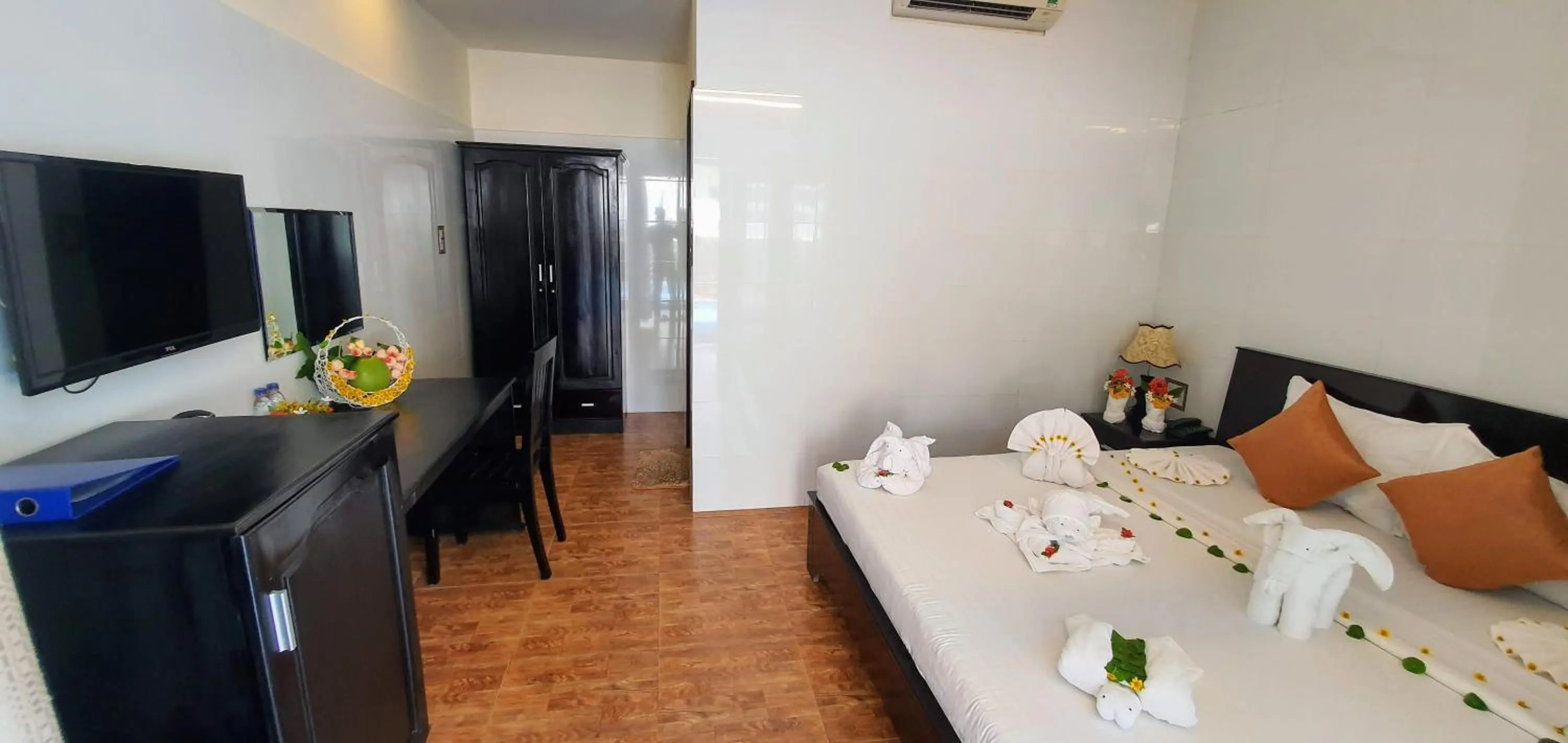 Bed in Sun & Sands Beach Hotel