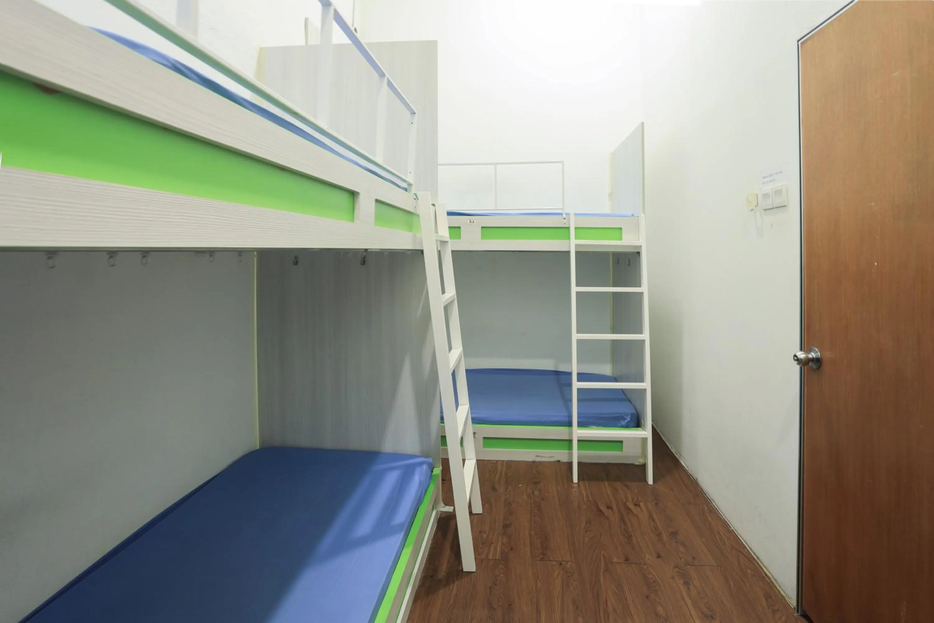 Bedroom in SPOT ON 90236 Zigzag Travellers Home