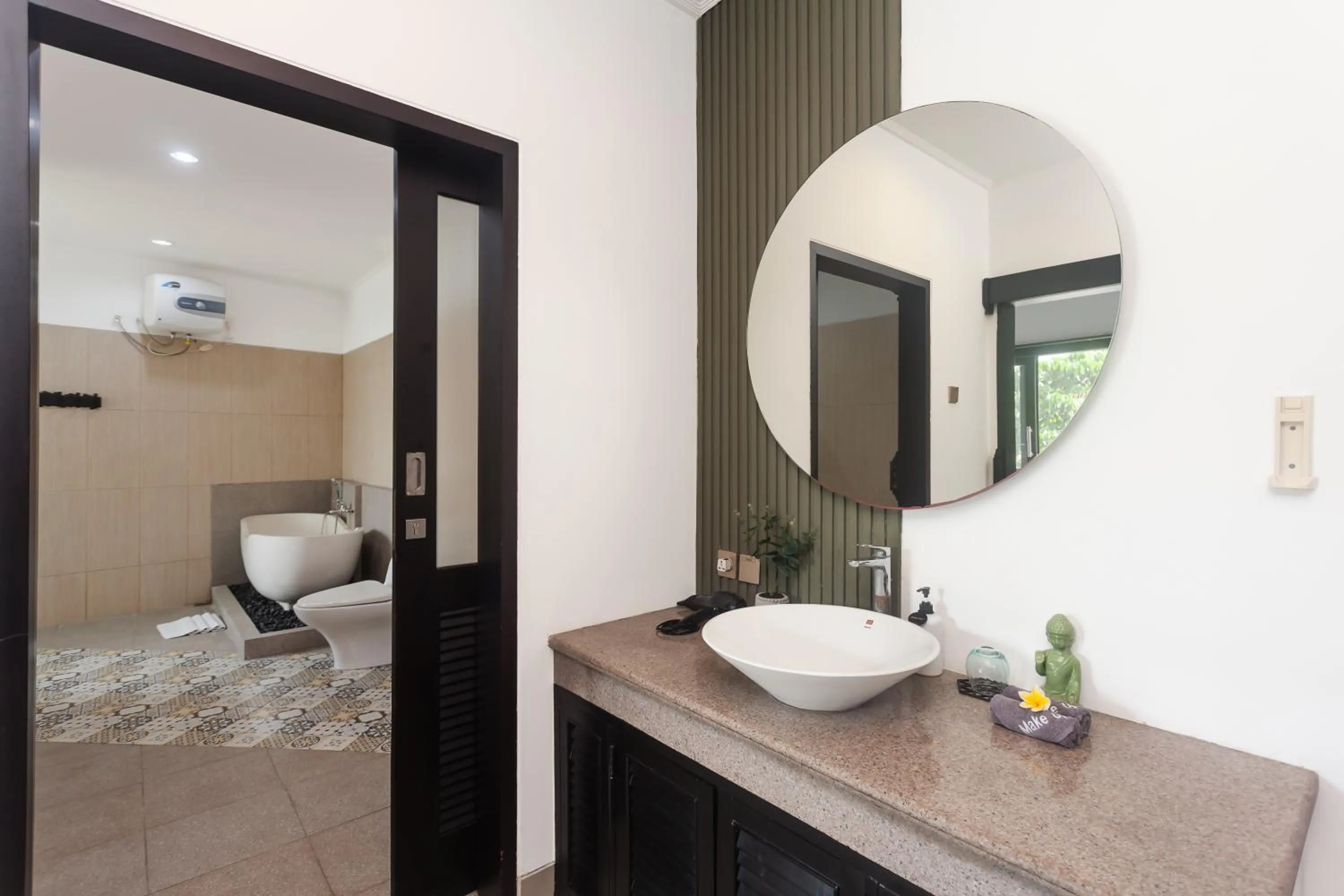 Bathroom in Maja Villa Batubelig by GenuineHost