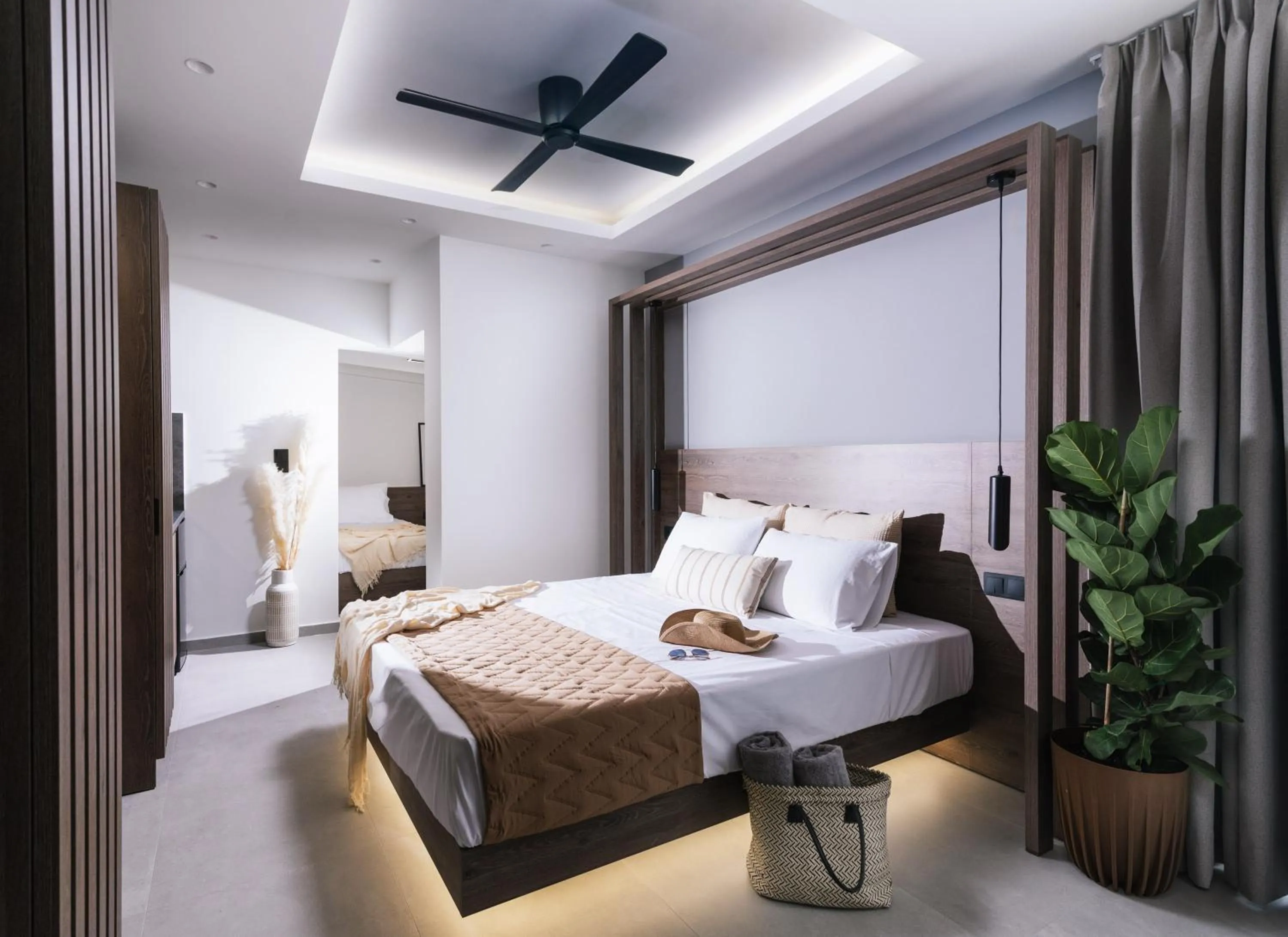 Bed in Alcyone Studios and Apartments