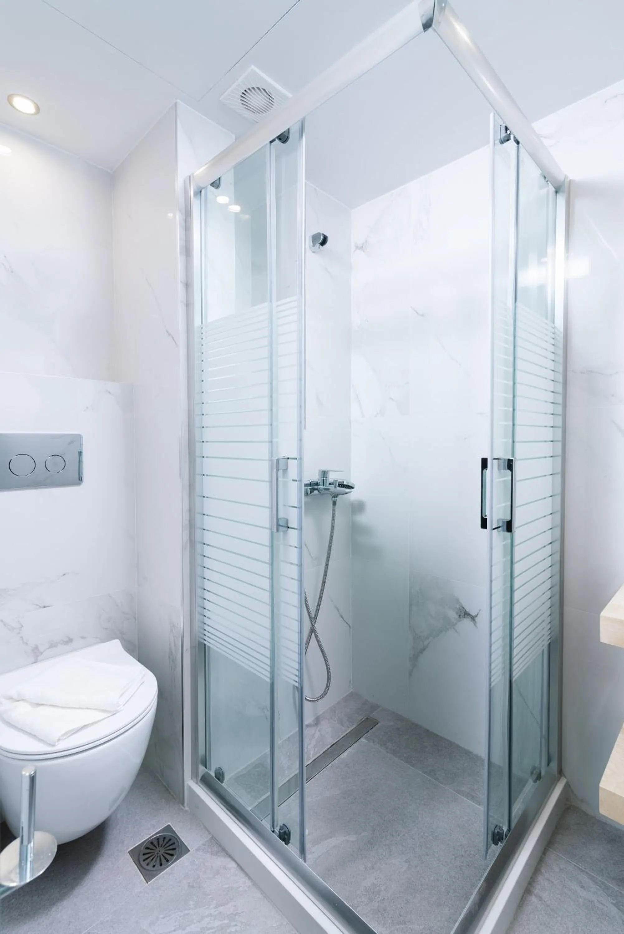 Shower in Alcyone Studios and Apartments