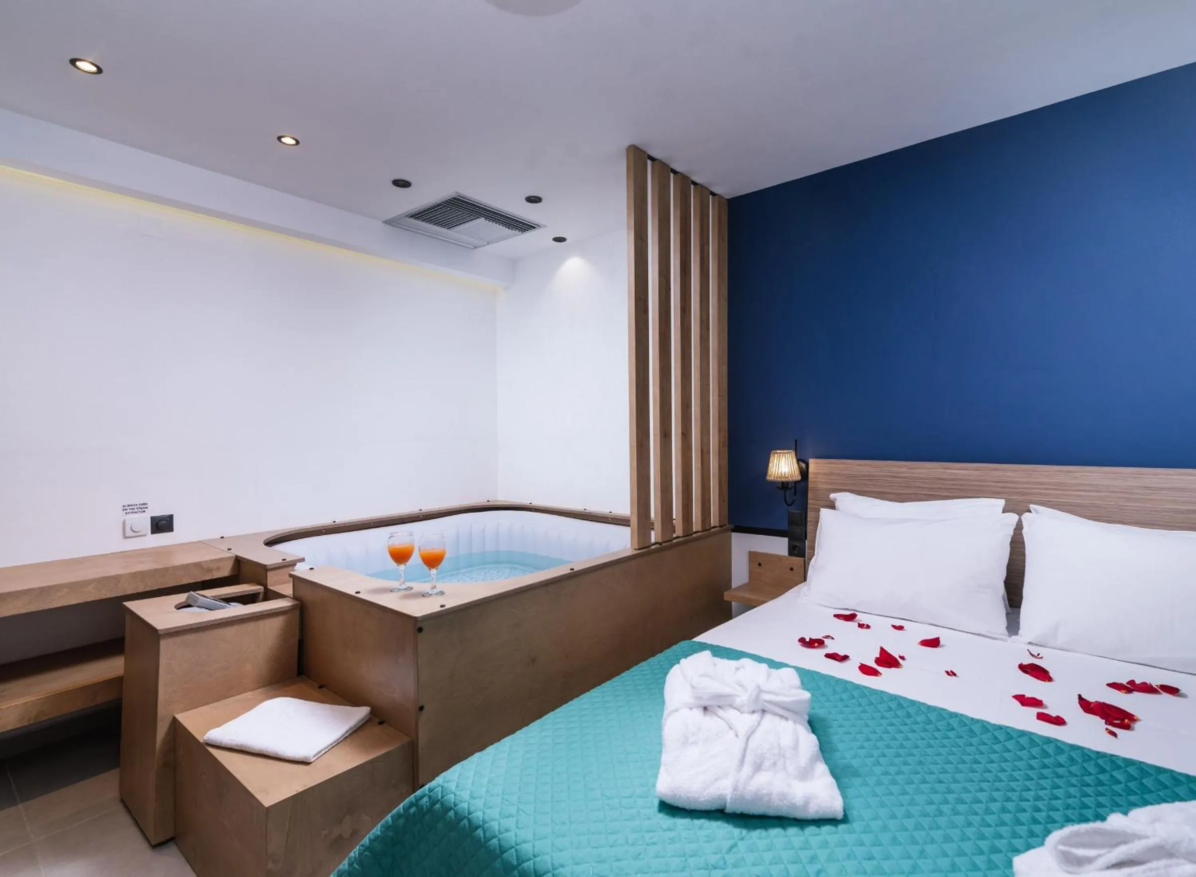 Bed in Alcyone Studios and Apartments