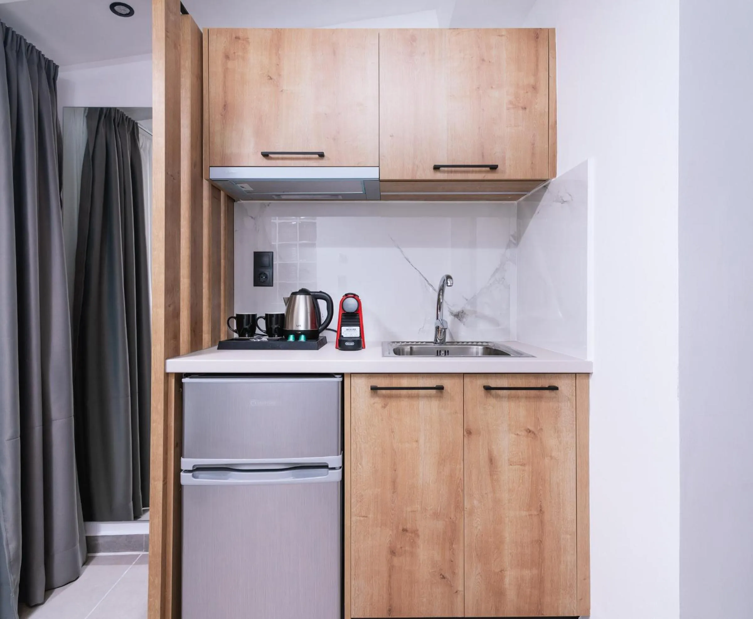 Kitchen or kitchenette in Alcyone Studios and Apartments