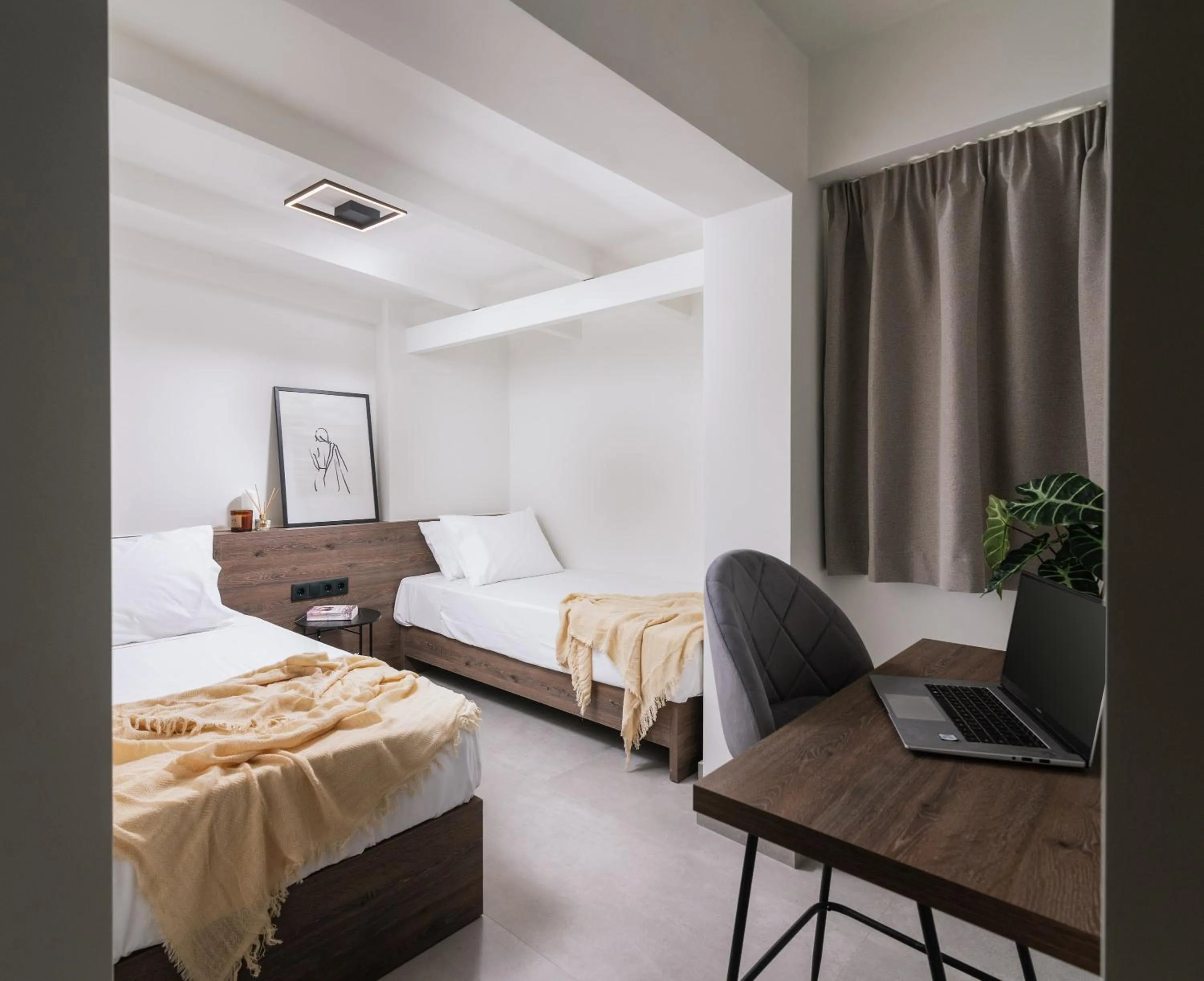 Bed in Alcyone Studios and Apartments