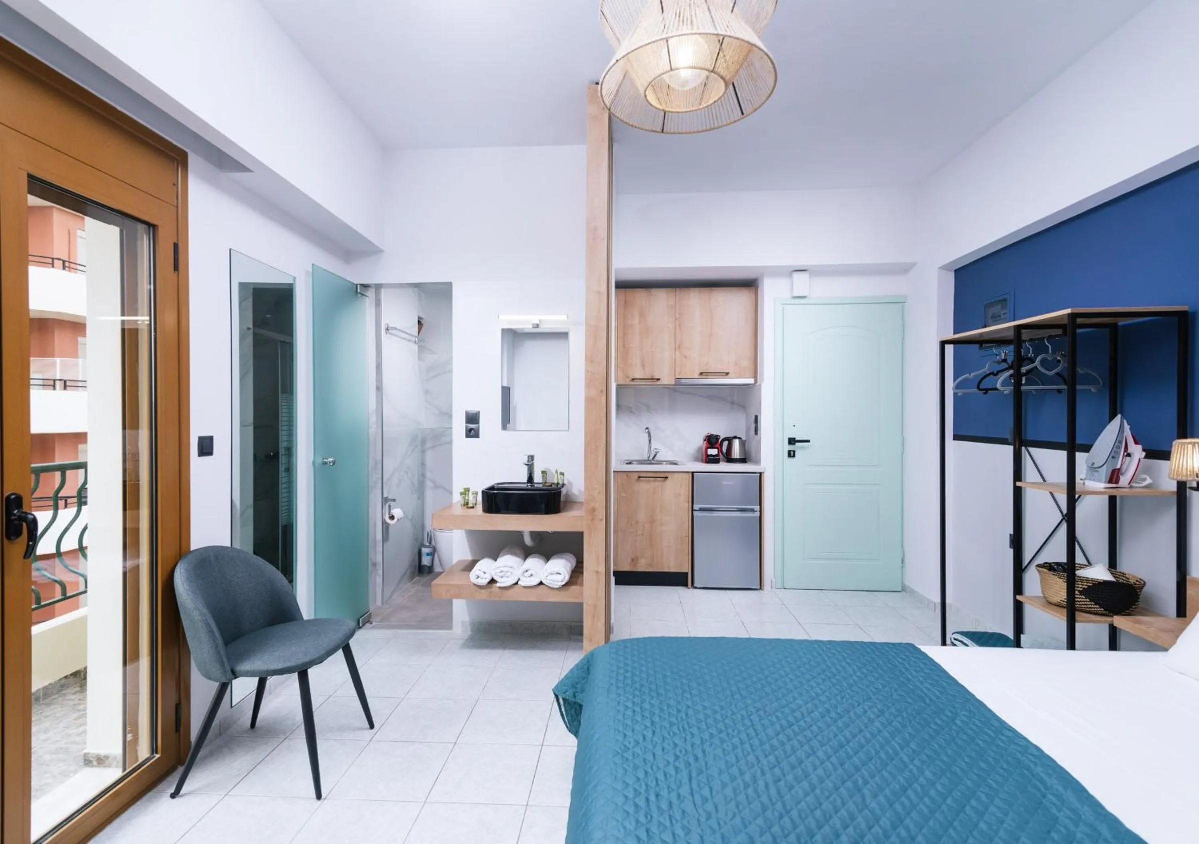 Bed in Alcyone Studios and Apartments