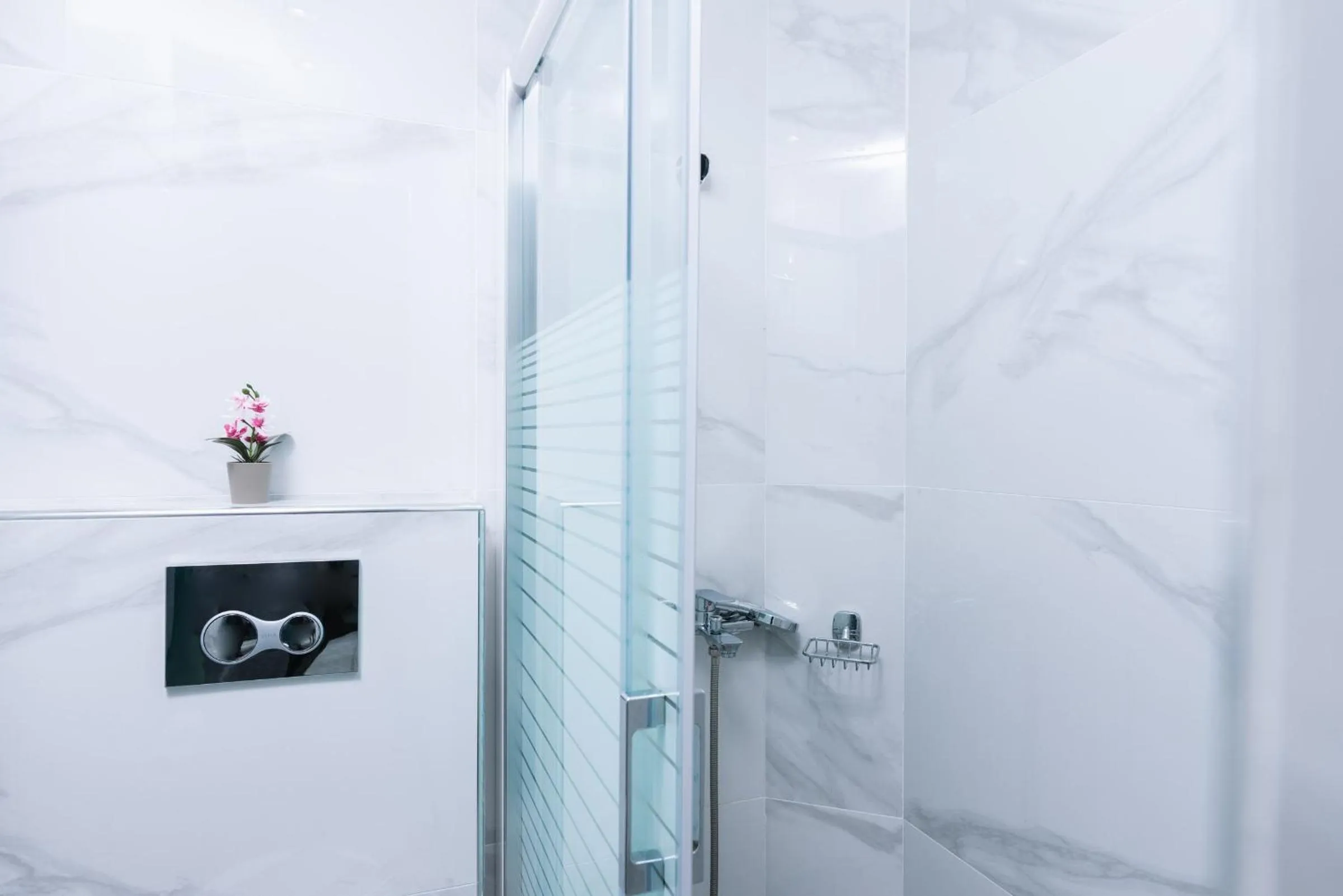 Shower in Alcyone Studios and Apartments