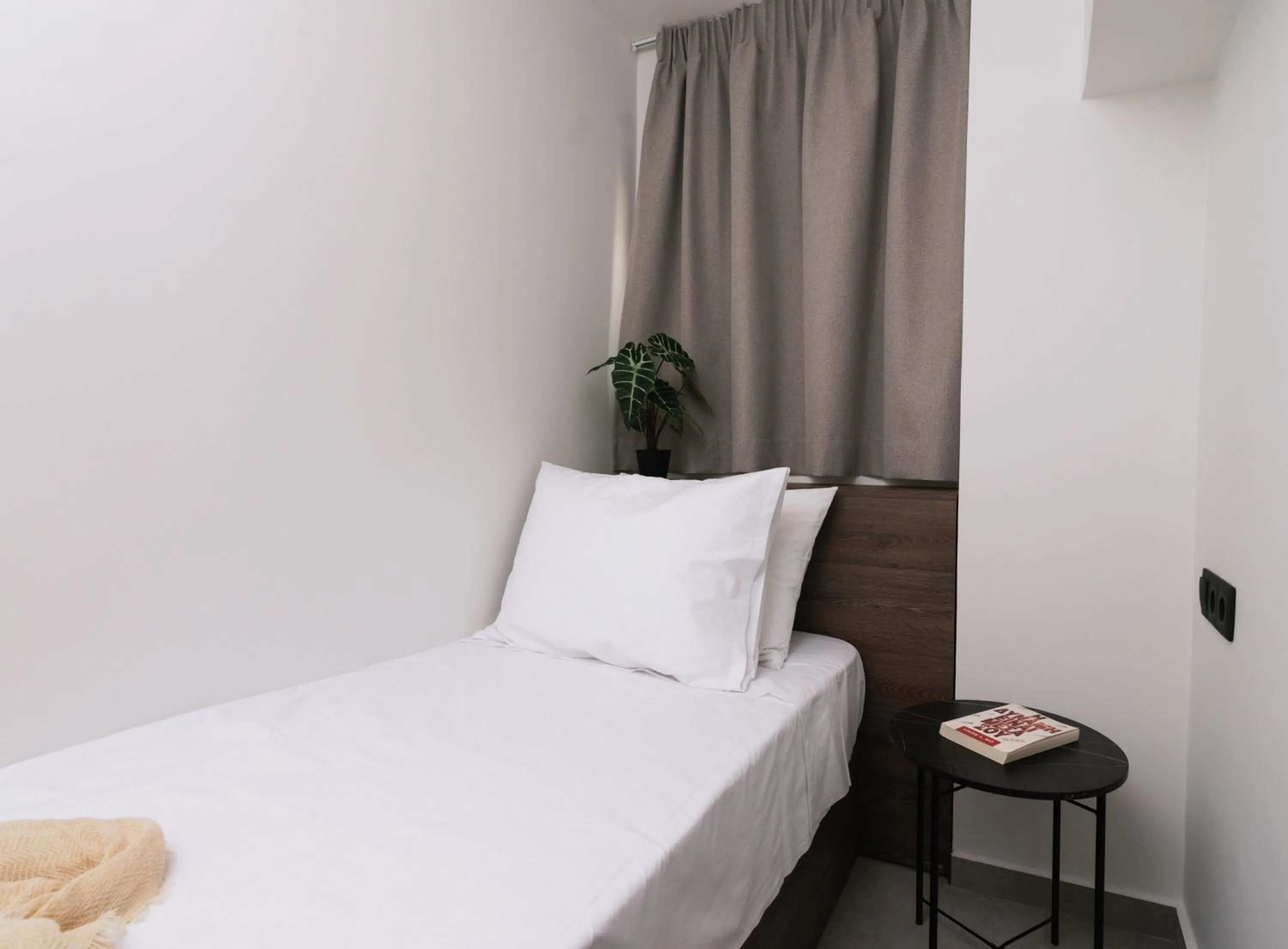 Bed in Alcyone Studios and Apartments