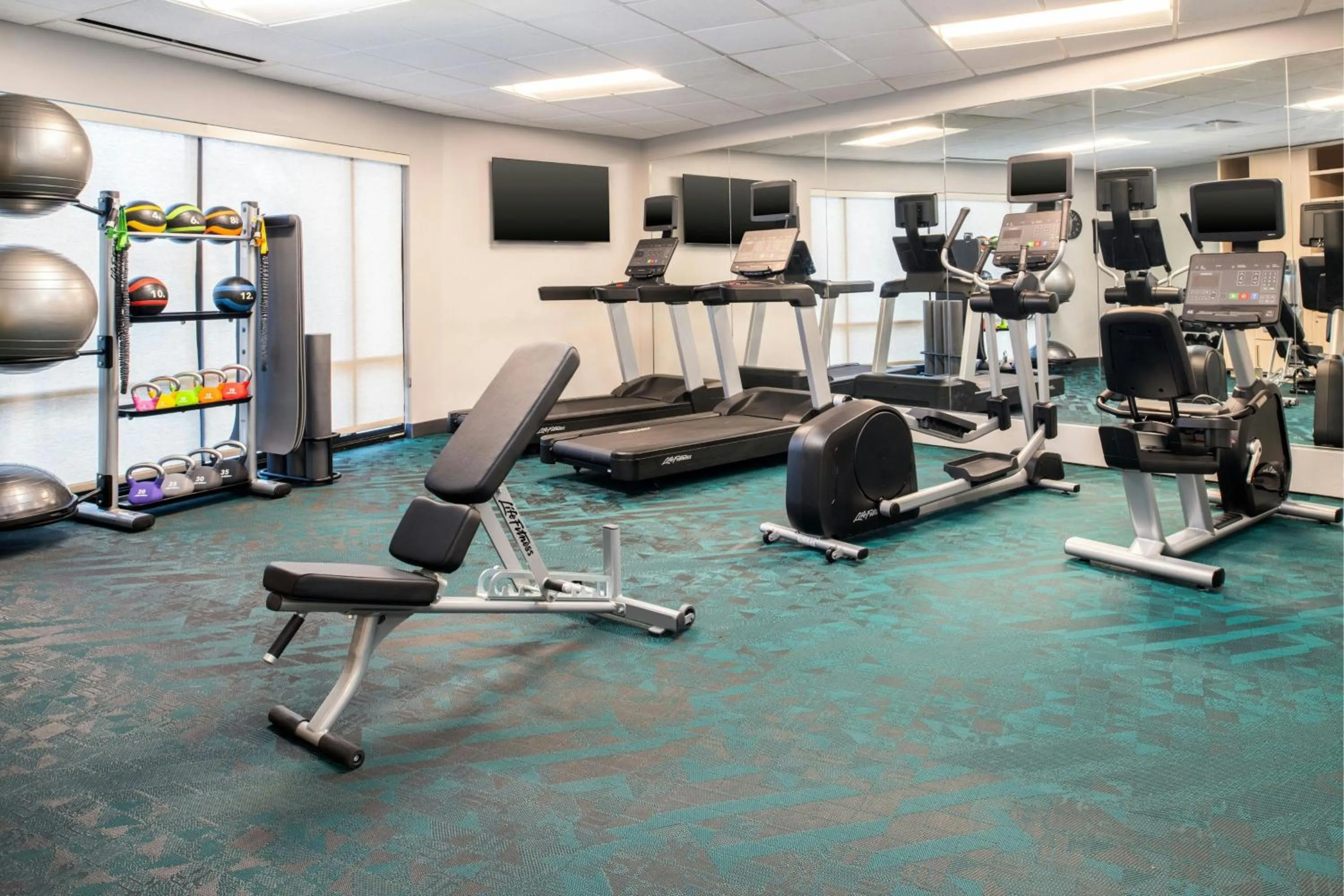 Fitness centre/facilities in TownePlace Suites by Marriott Jackson Ridgeland/The Township at Colony Park