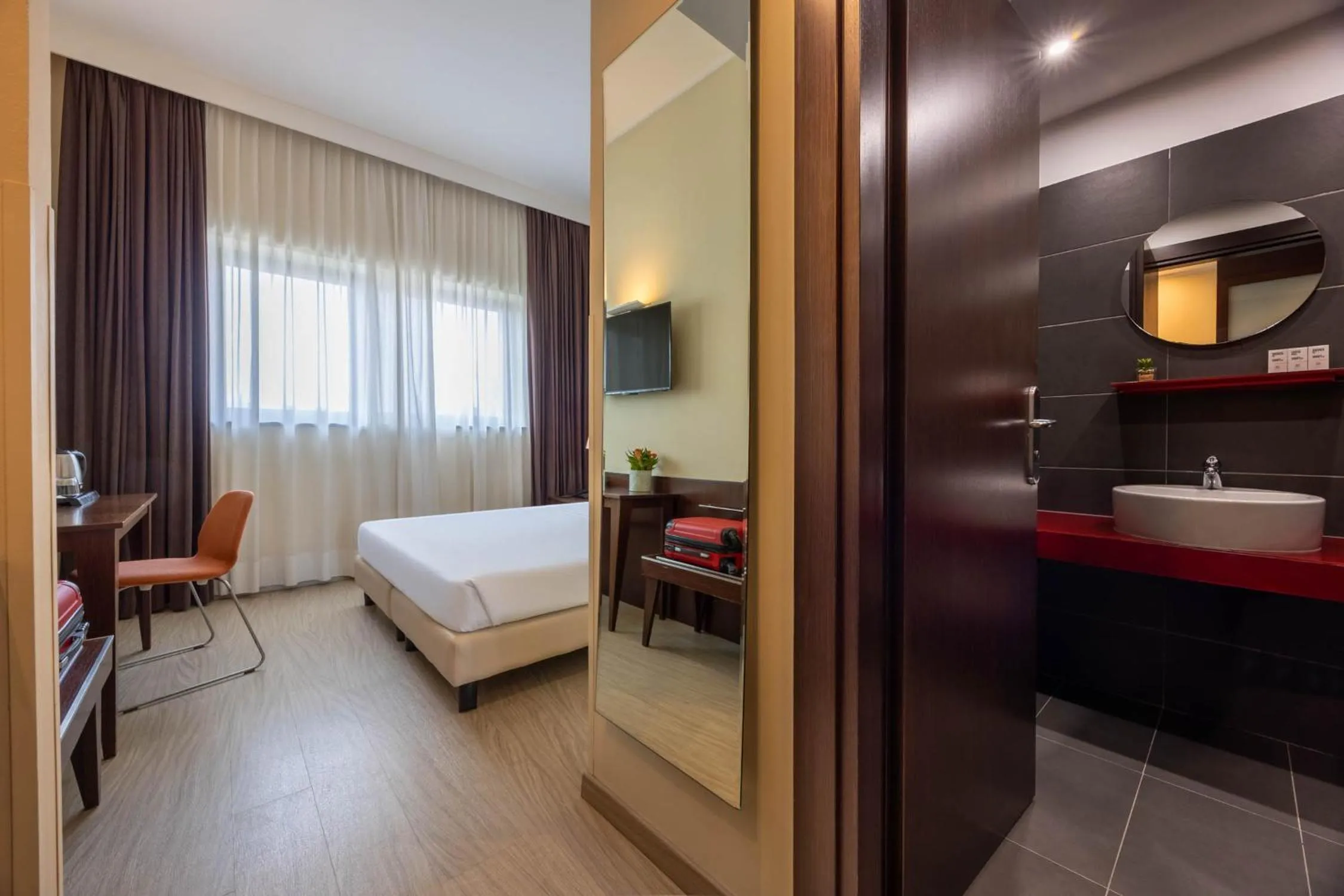 Bed in iH Hotels Milano Watt 13