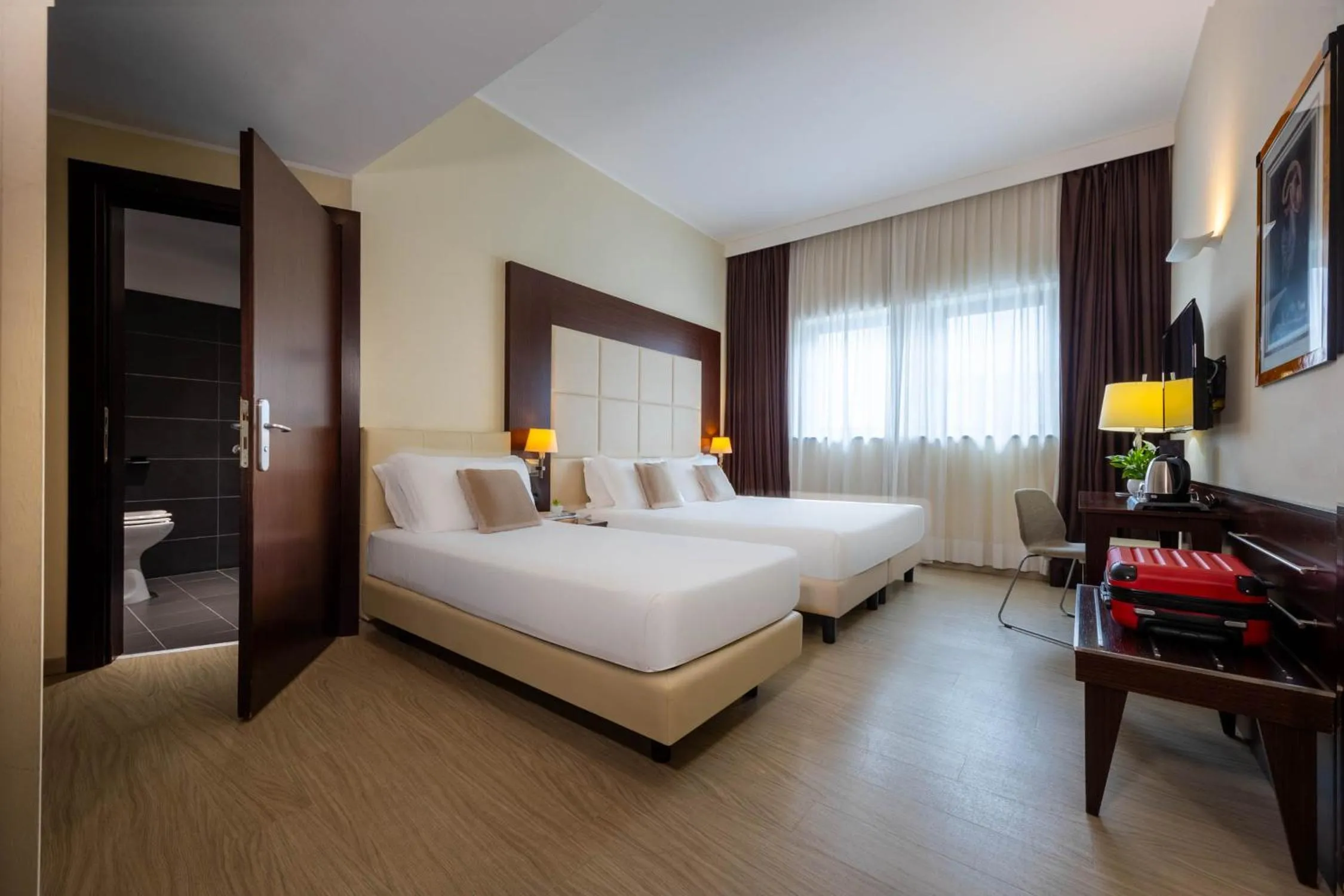 Bed in iH Hotels Milano Watt 13