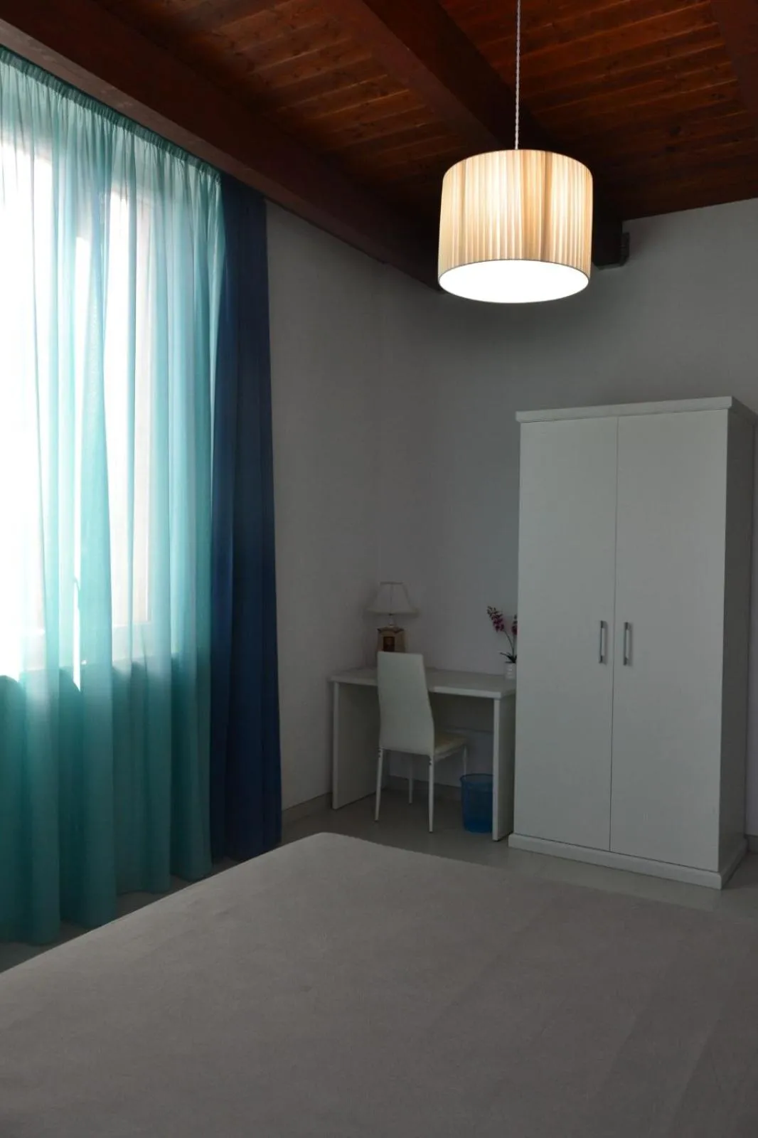 Photo of the whole room, Bed in Stellaris