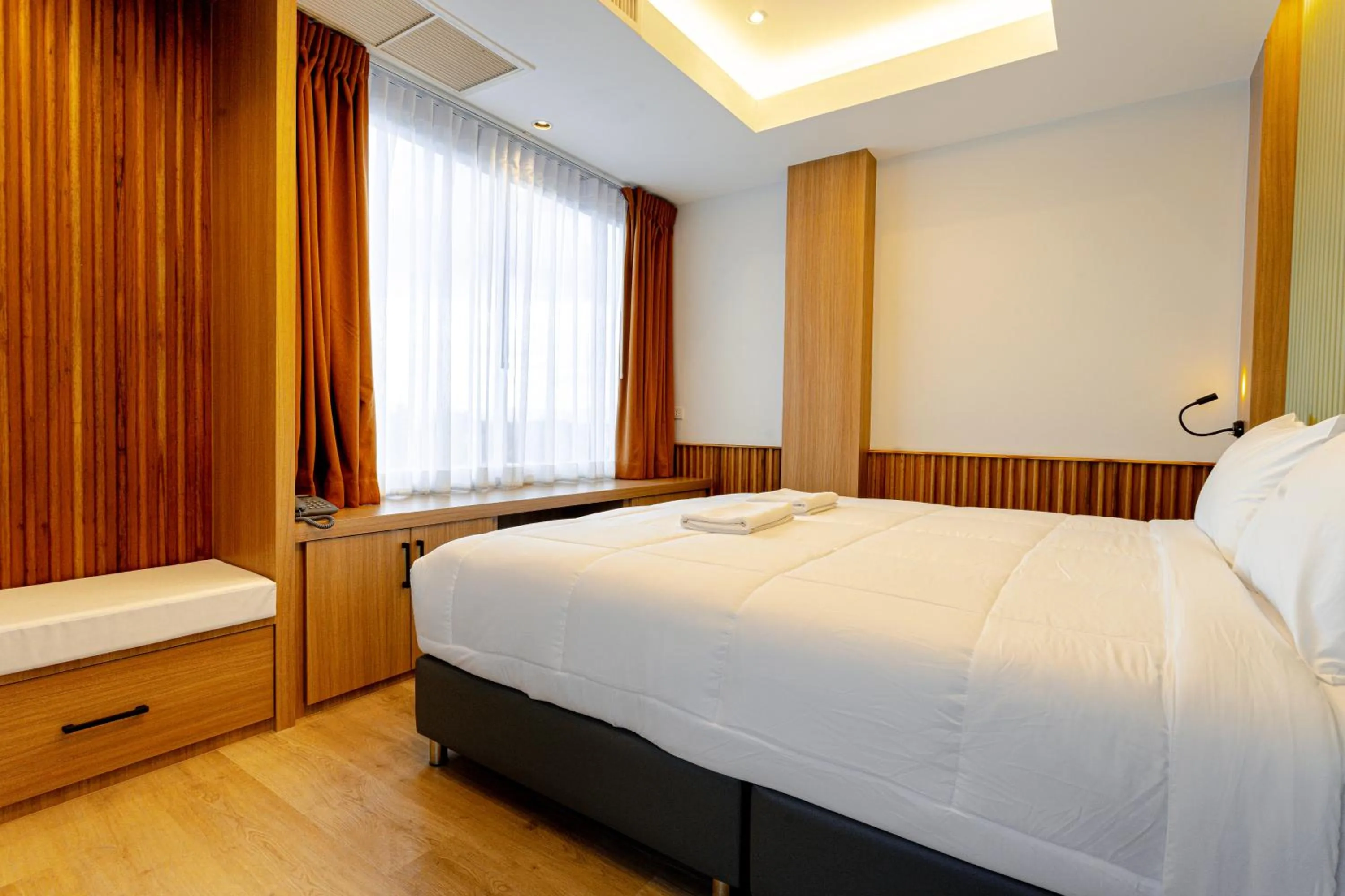 Bed in Nakornping Boutique Hotel