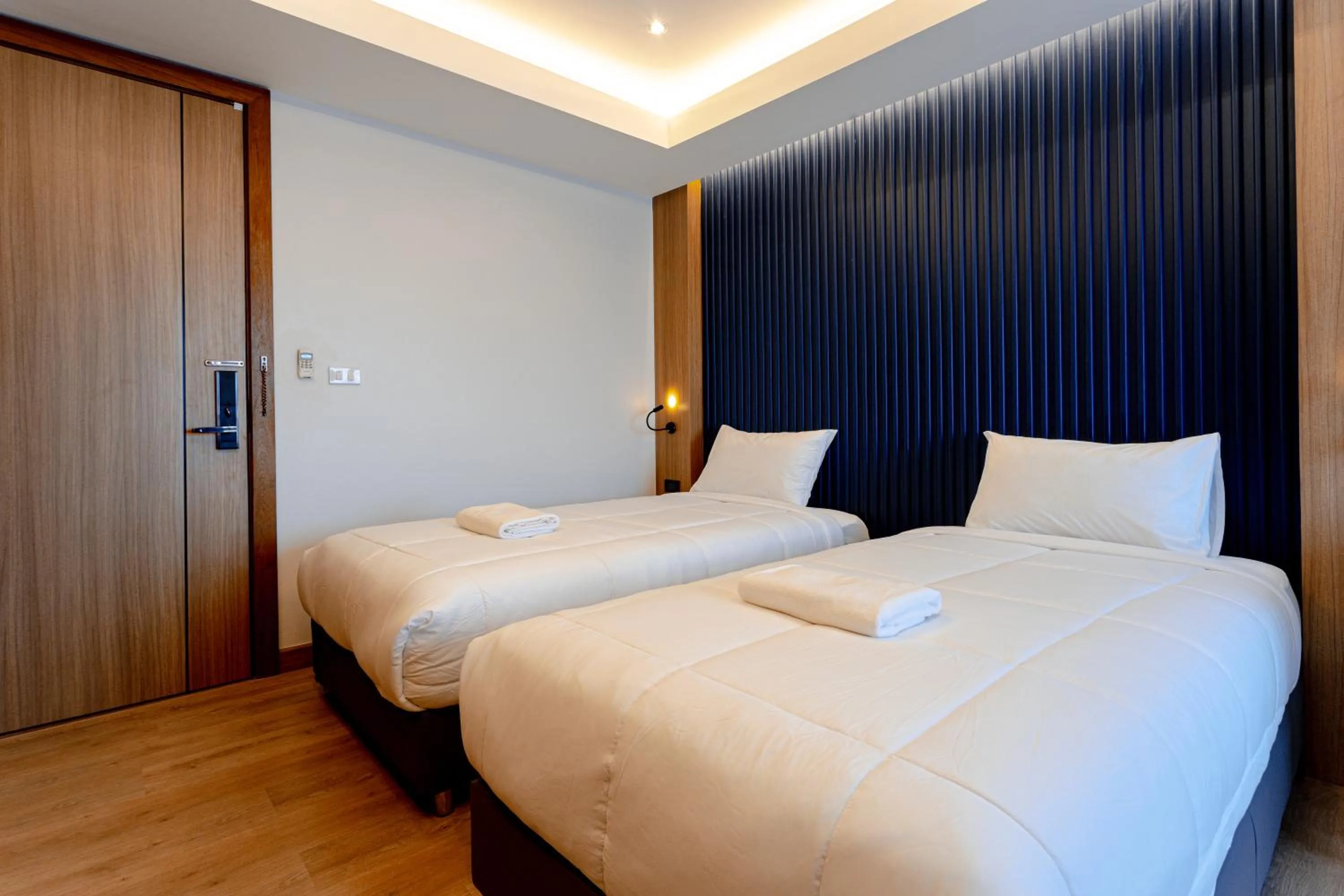 Bed in Nakornping Boutique Hotel