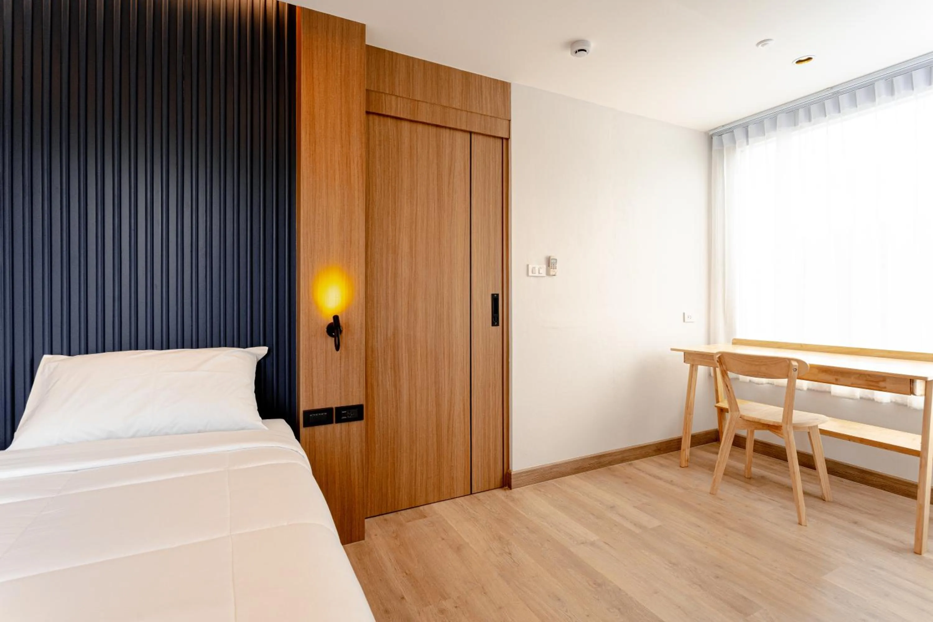 Bed in Nakornping Boutique Hotel