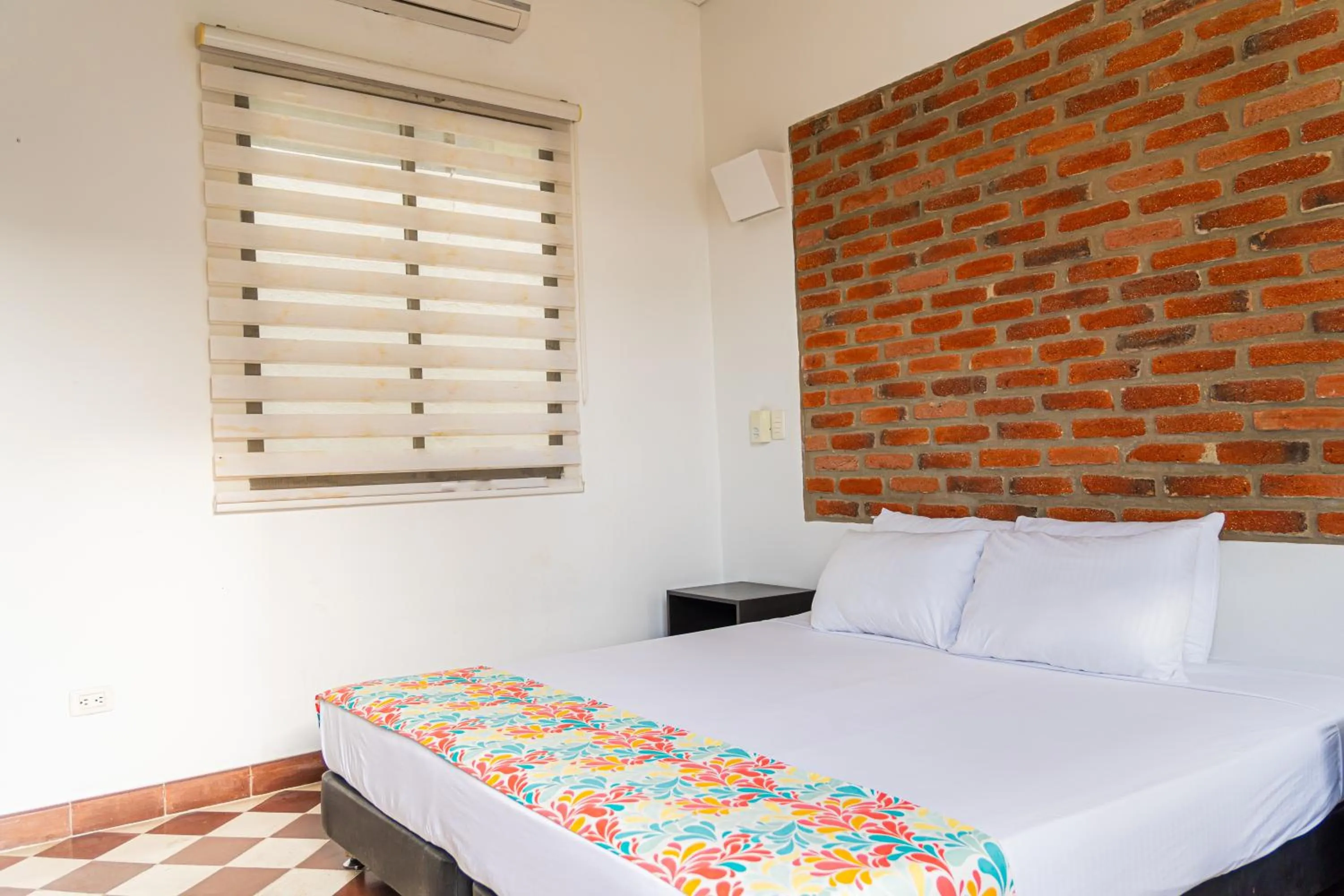 Bed in Hotel Puerto Pelicano