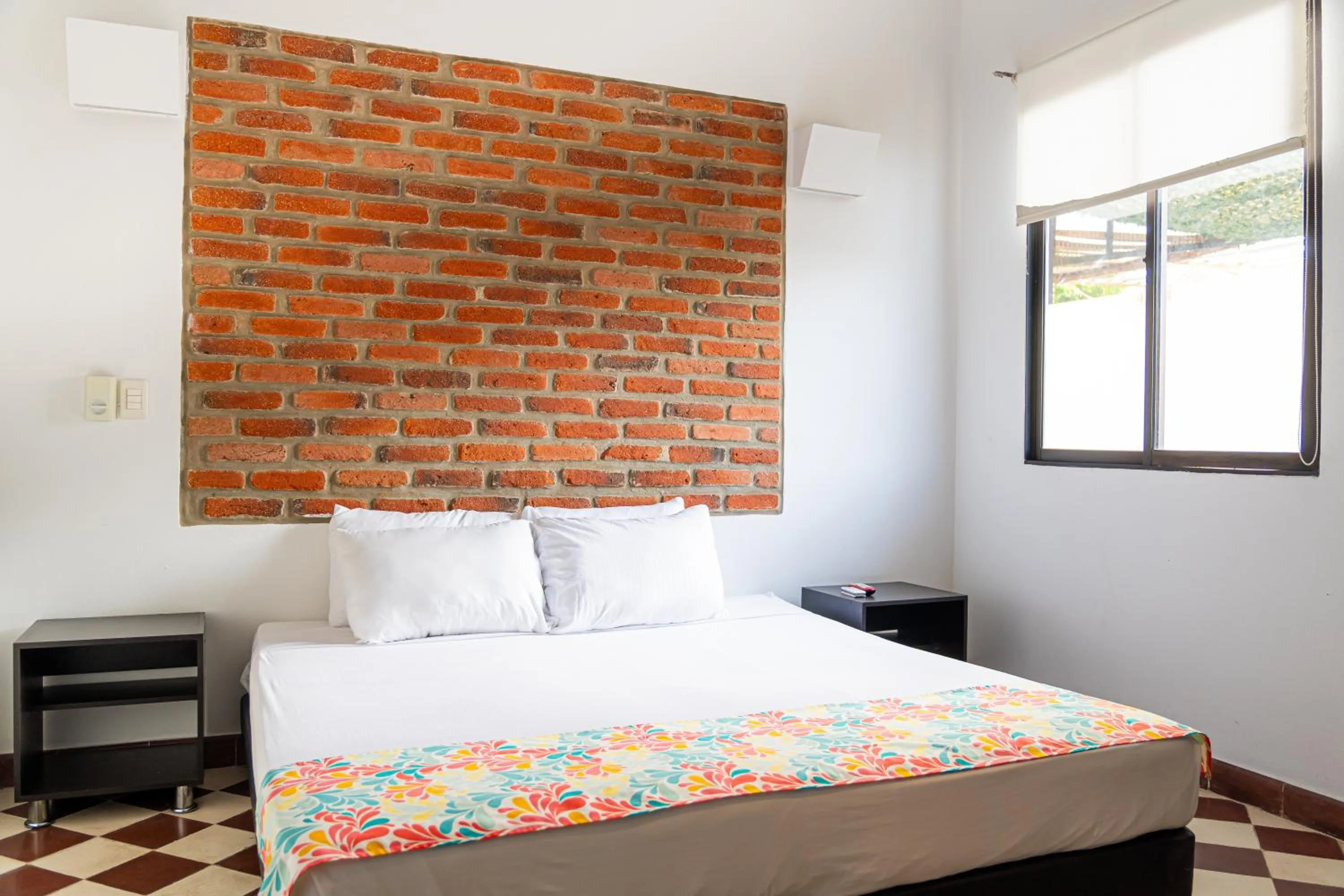 Bed in Hotel Puerto Pelicano