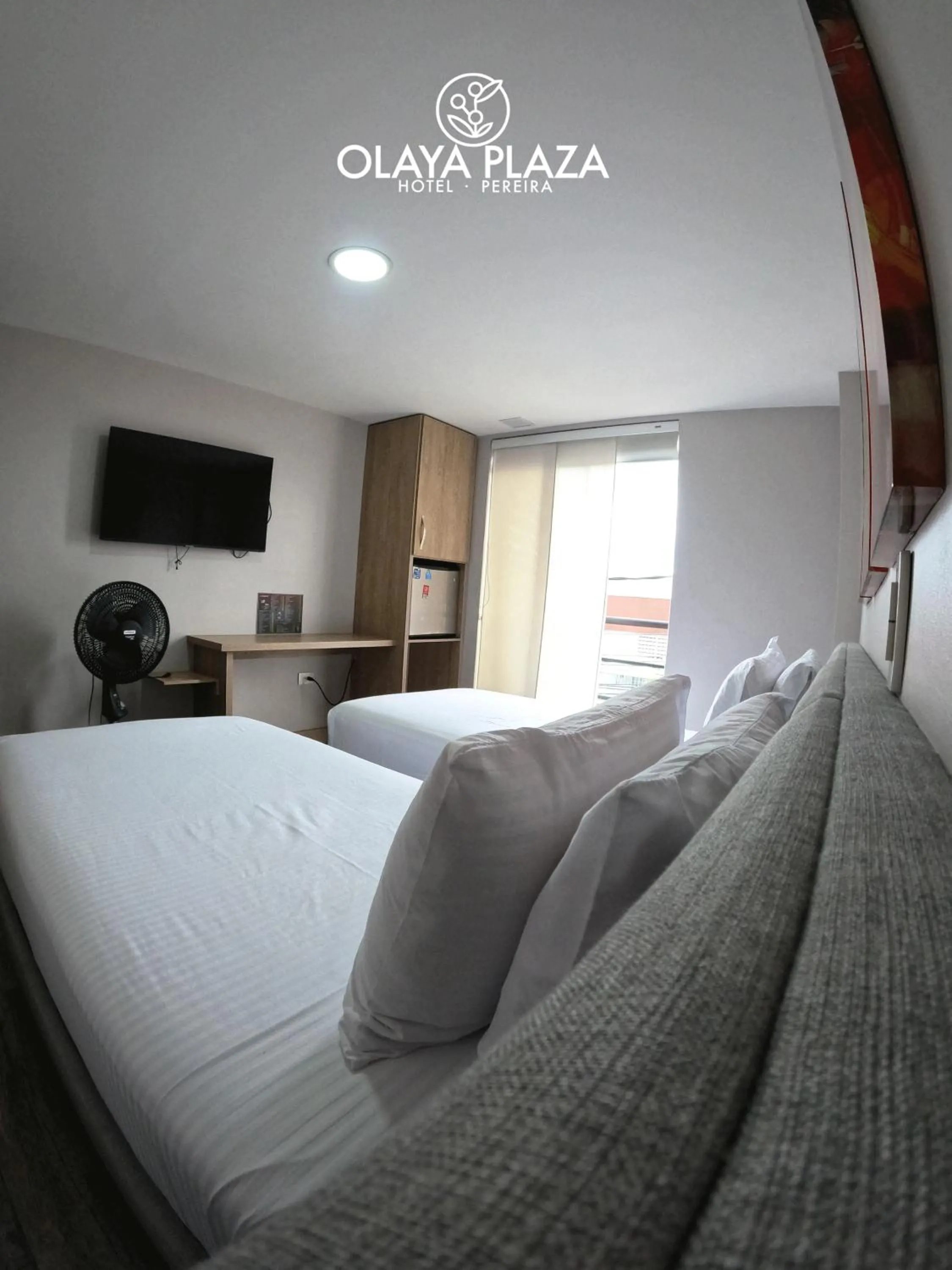 Bed in Hotel Olaya Plaza