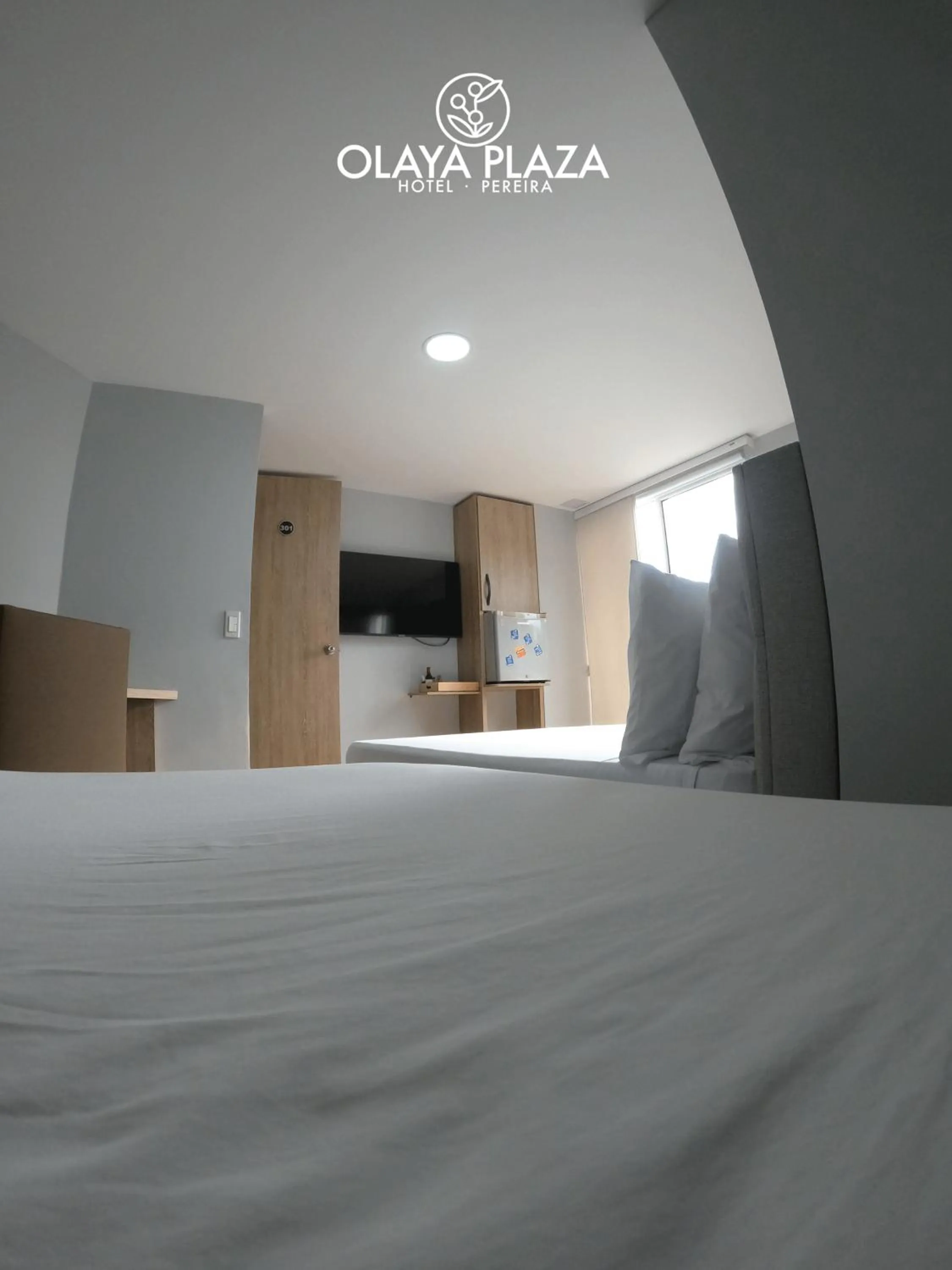 Bed in Hotel Olaya Plaza