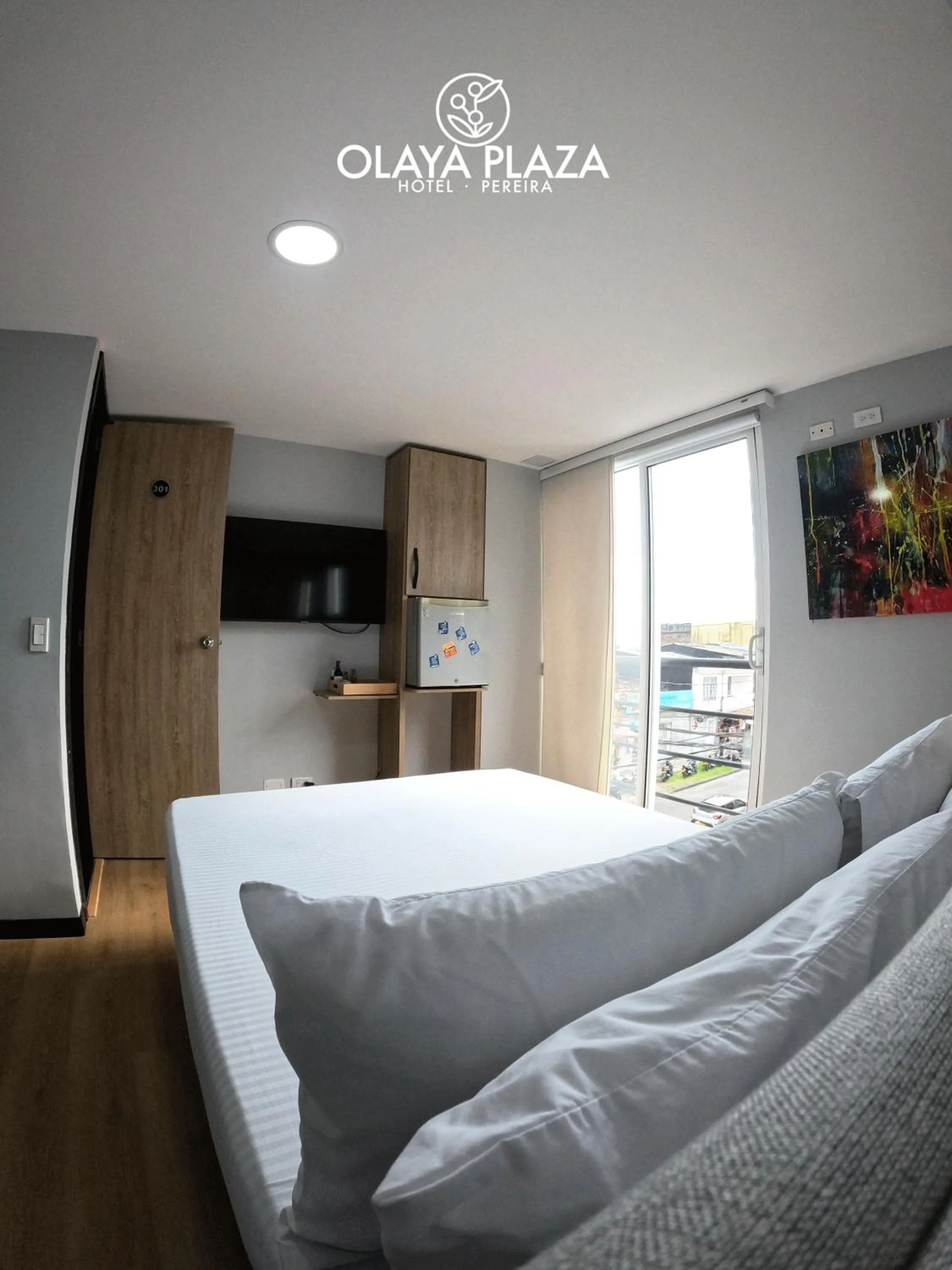 Bed in Hotel Olaya Plaza