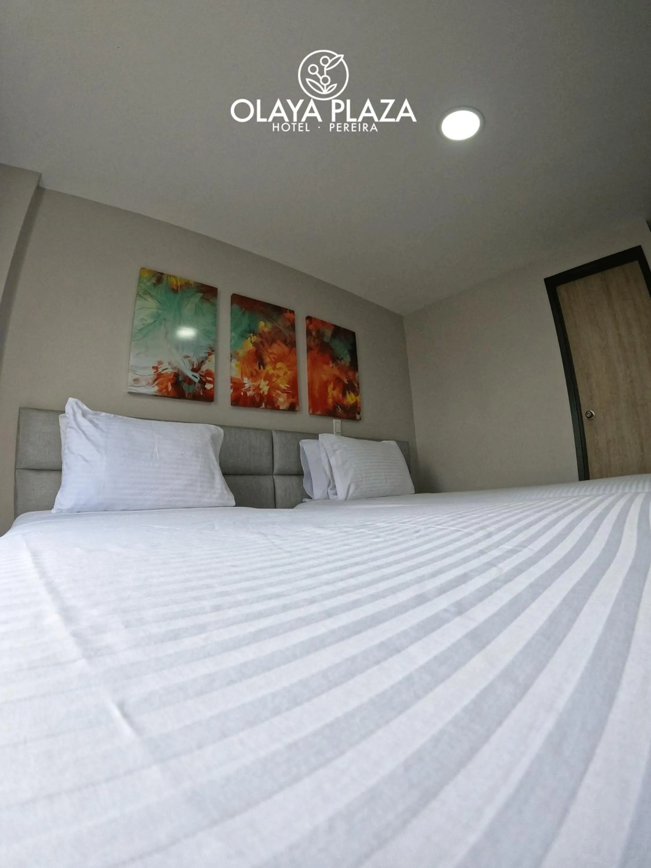 Bed in Hotel Olaya Plaza