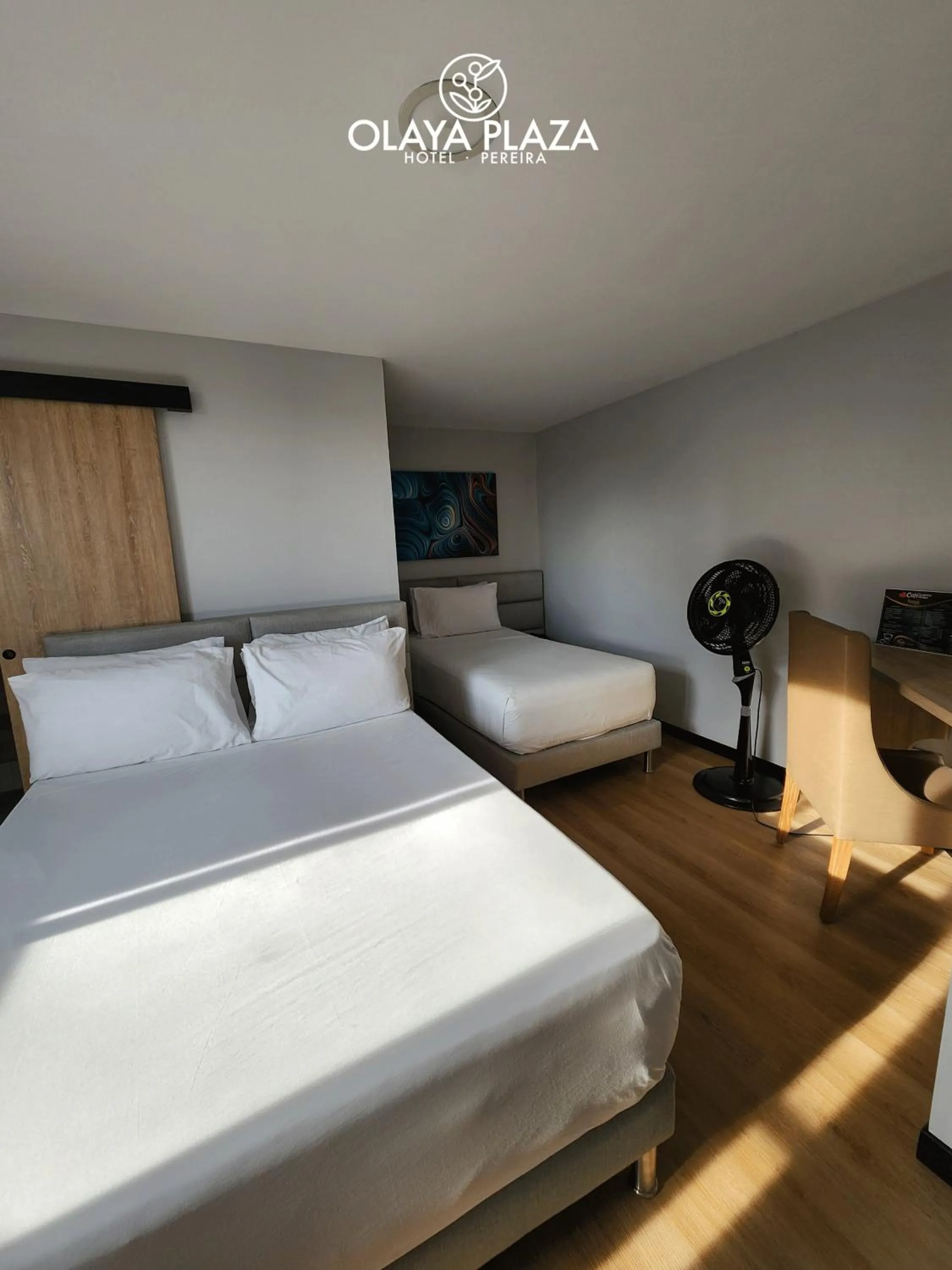 Bed in Hotel Olaya Plaza