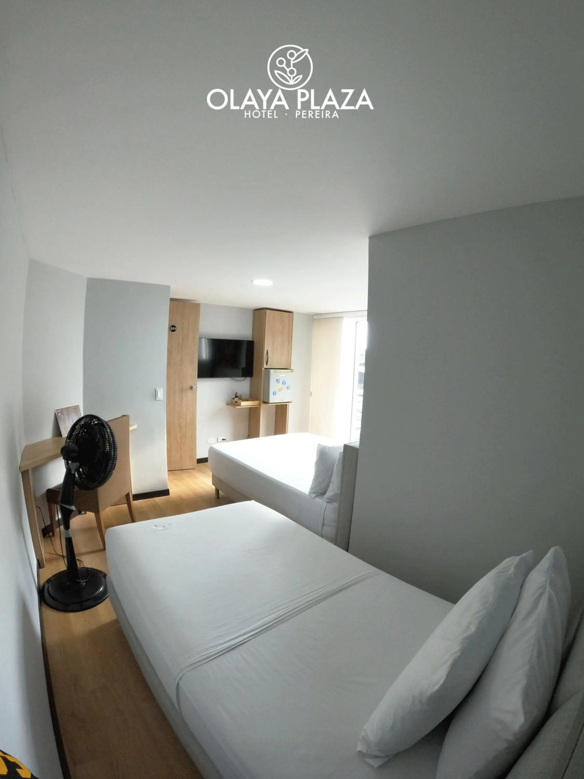 Bed in Hotel Olaya Plaza