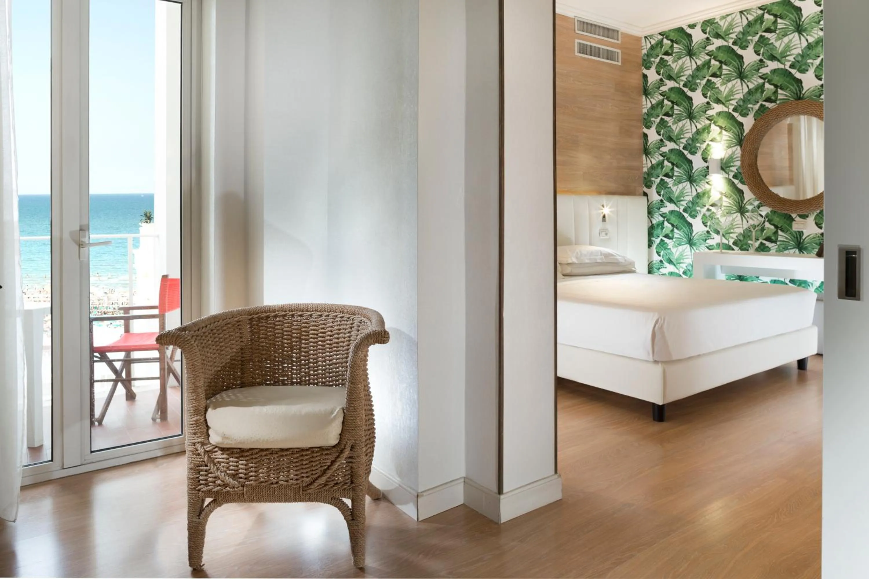 Living room, Bed in Hotel Corallo