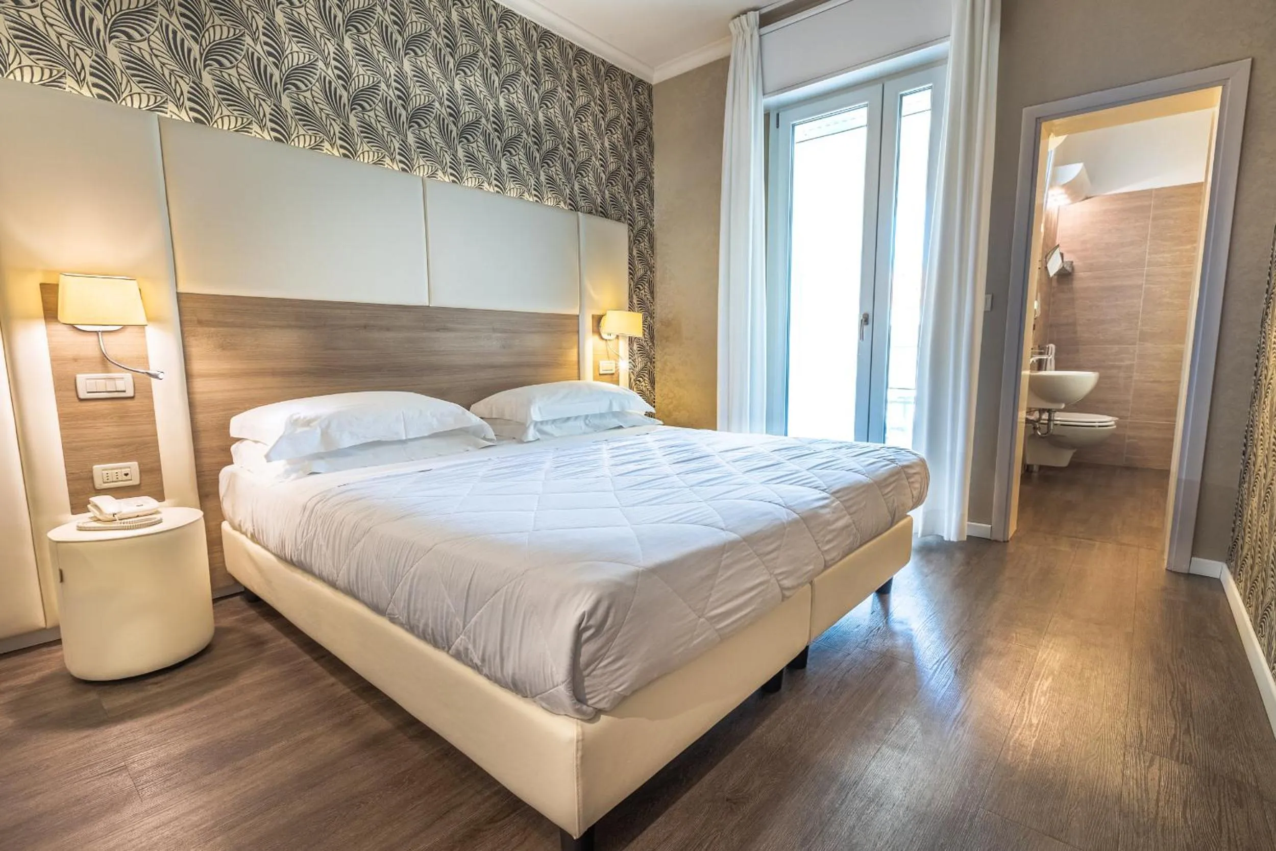 Bed in Hotel Corallo