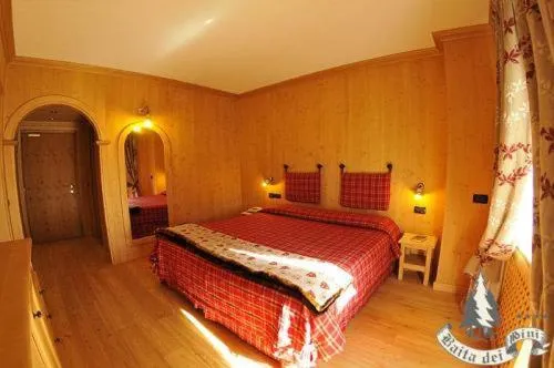 Bedroom, Bed in Hotel Baita Dei Pini