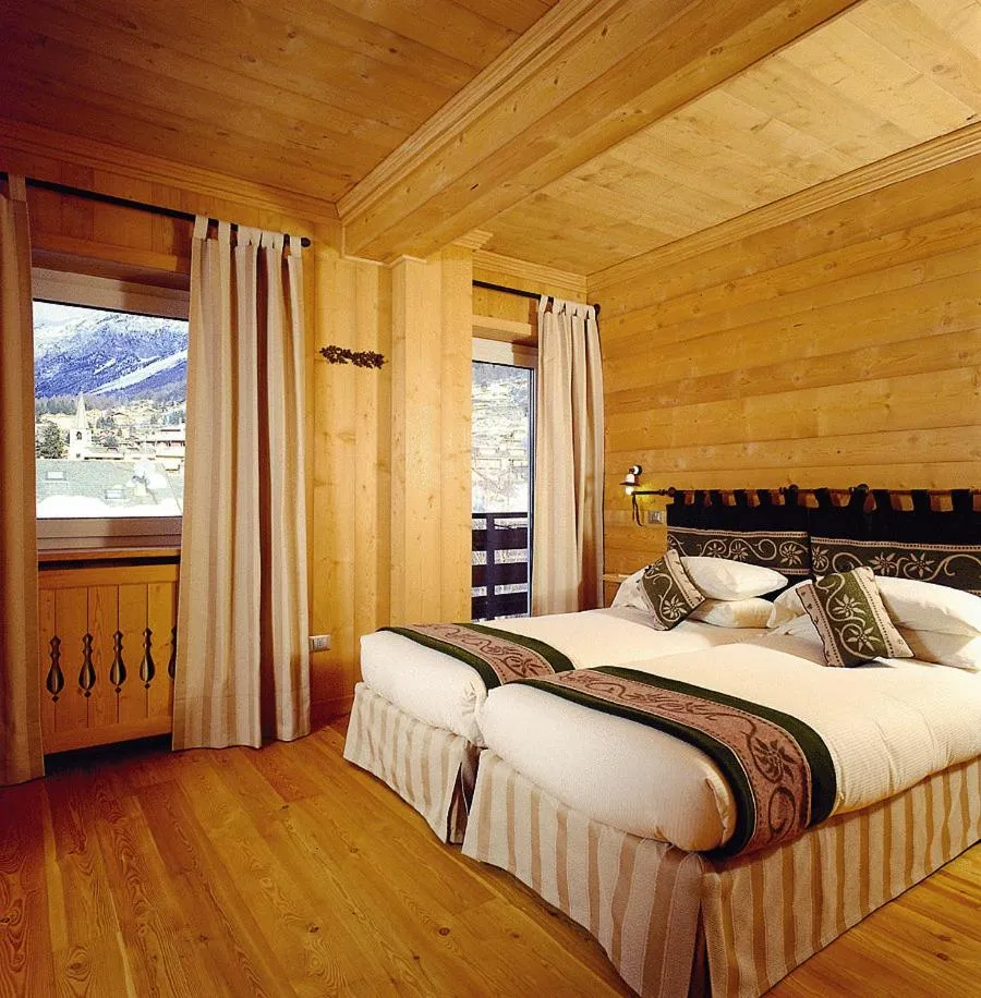 Bedroom, Bed in Hotel Baita Dei Pini
