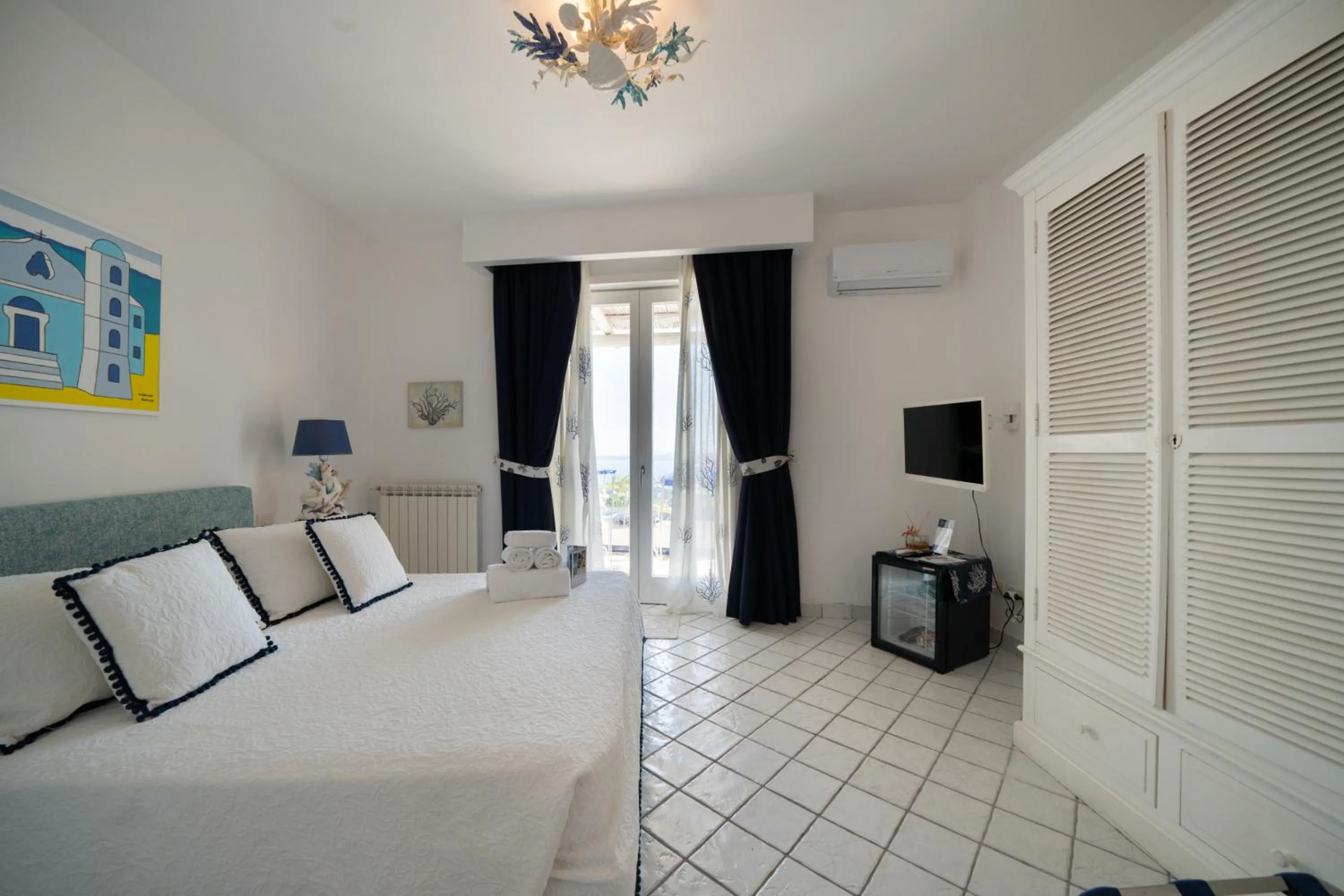 Bed in Relais Bijoux Ischia