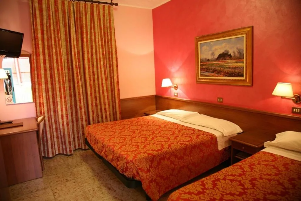 Bedroom in Hotel San Pellegrino
