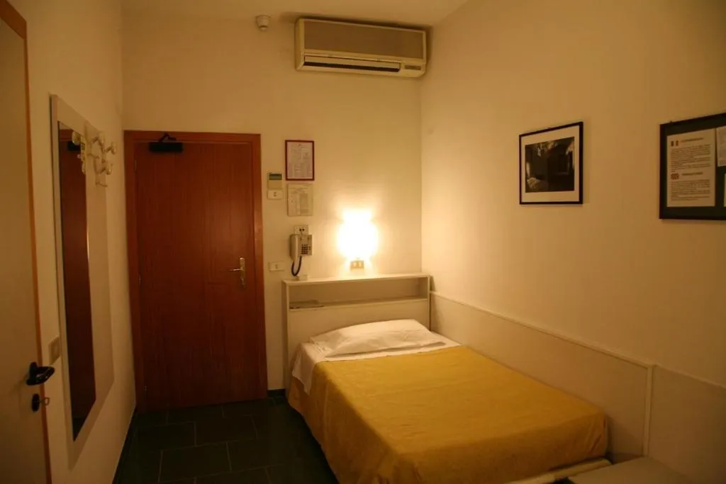 Bedroom in Hotel San Pellegrino