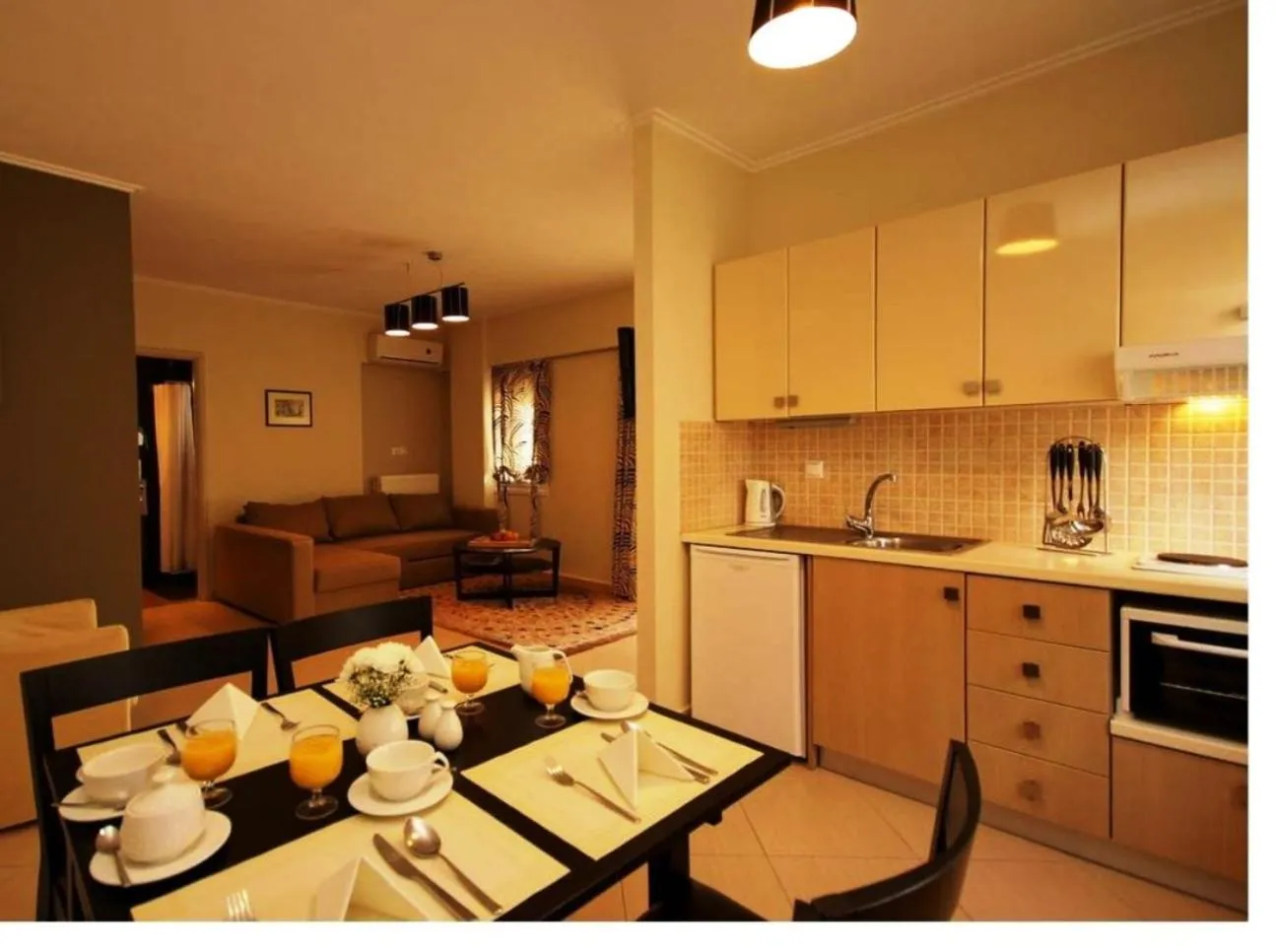 Kitchen or kitchenette in Palatino Rooms & Apartments