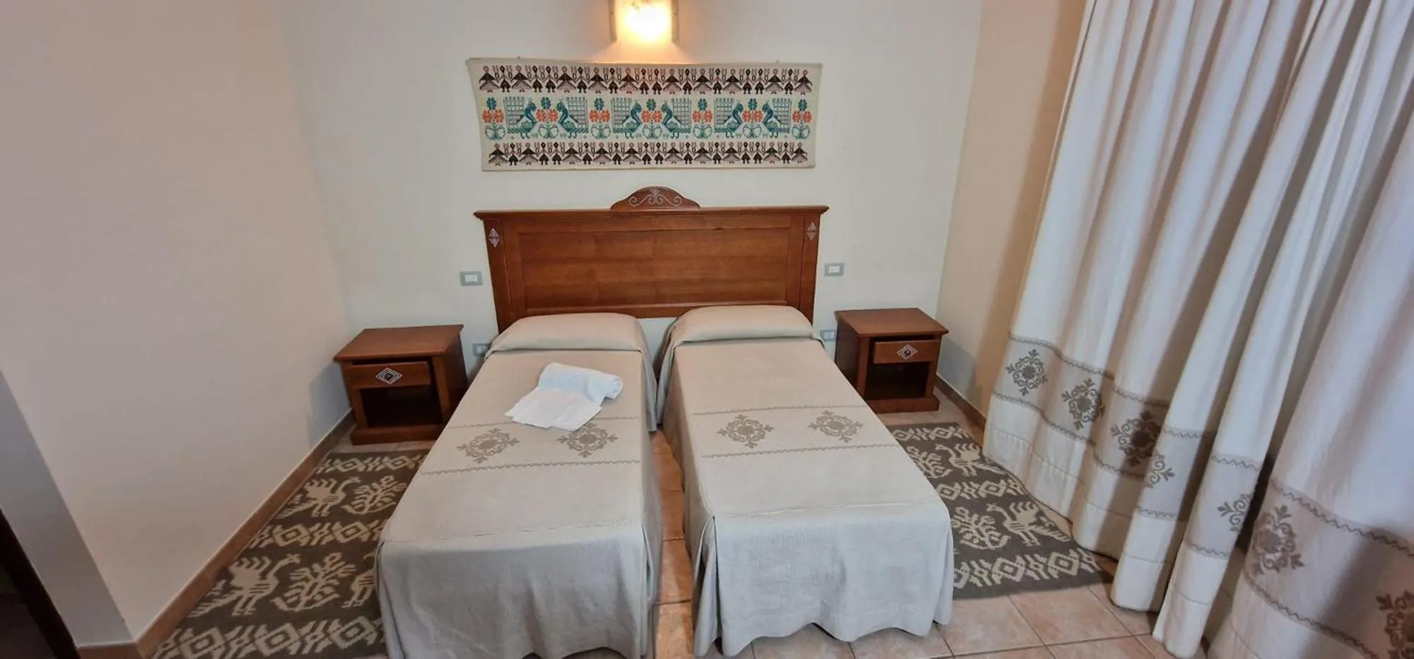 Bed in Albergo Ristorante Pizzeria Monte Arcosu