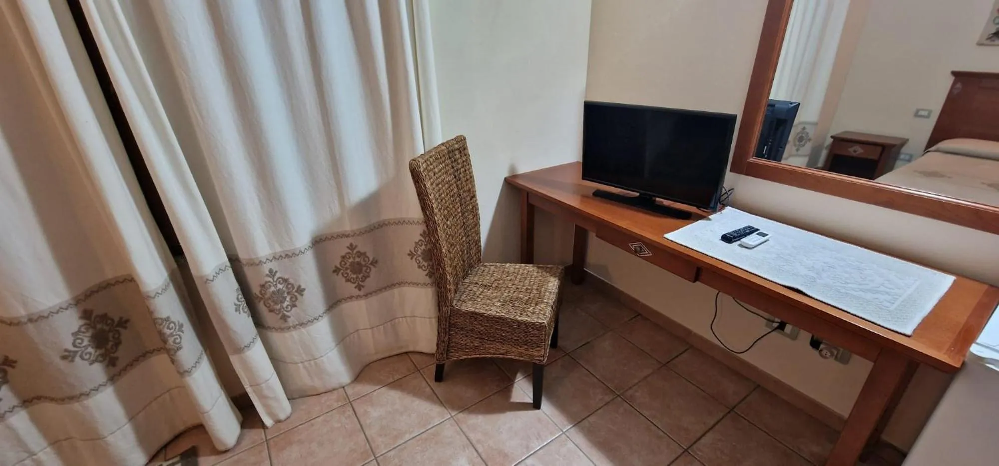 TV and multimedia in Albergo Ristorante Pizzeria Monte Arcosu