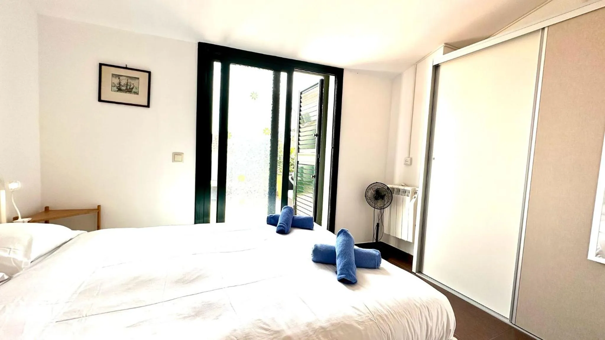 Bed in Blue sea apartment