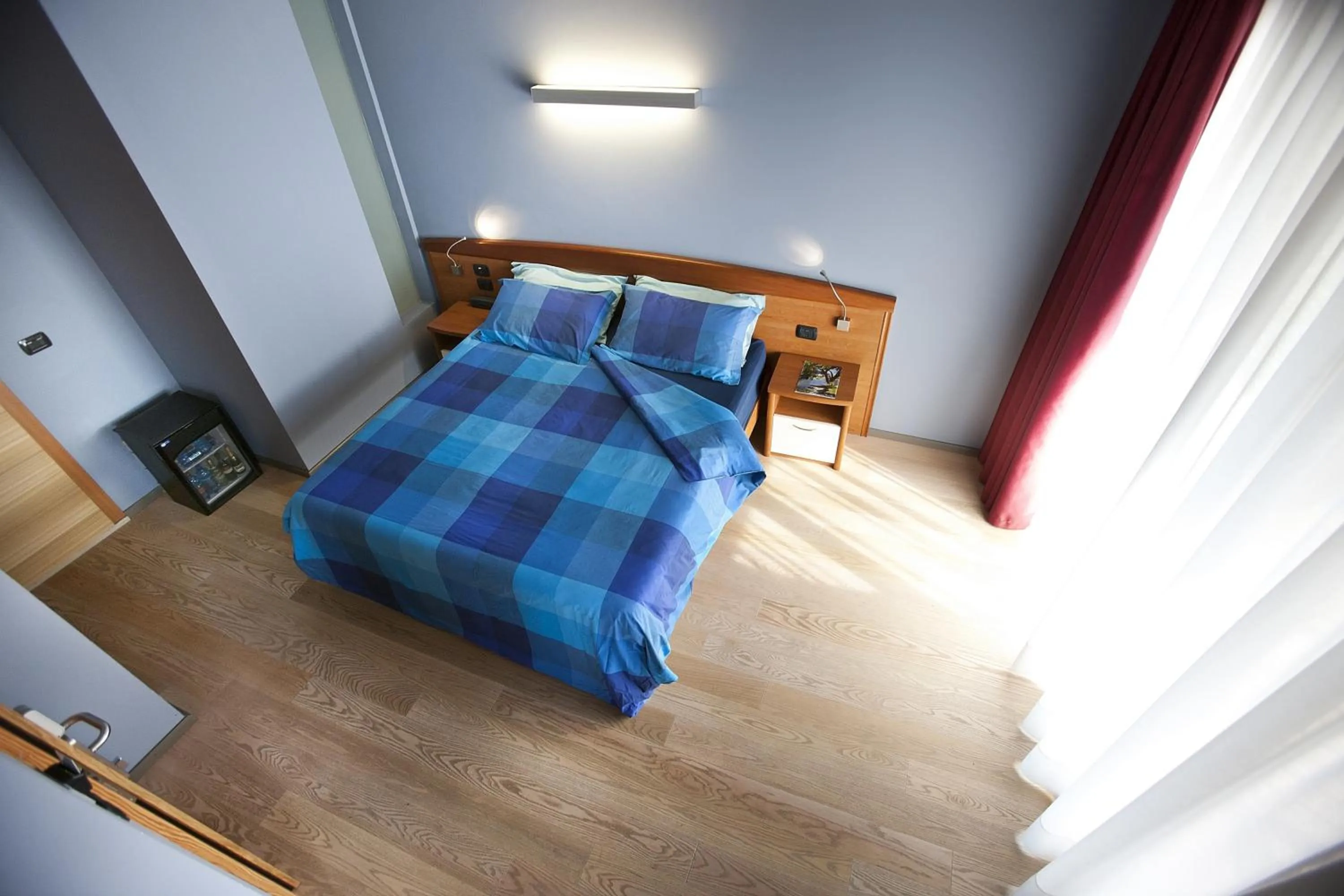 Bedroom in Ambienthotel Spiaggia