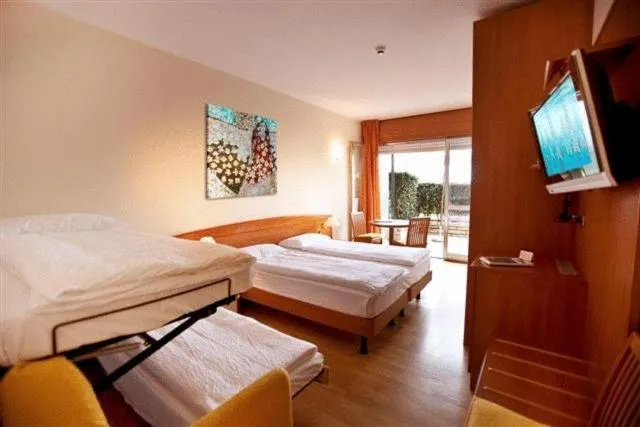 Bedroom in Ambienthotel Spiaggia