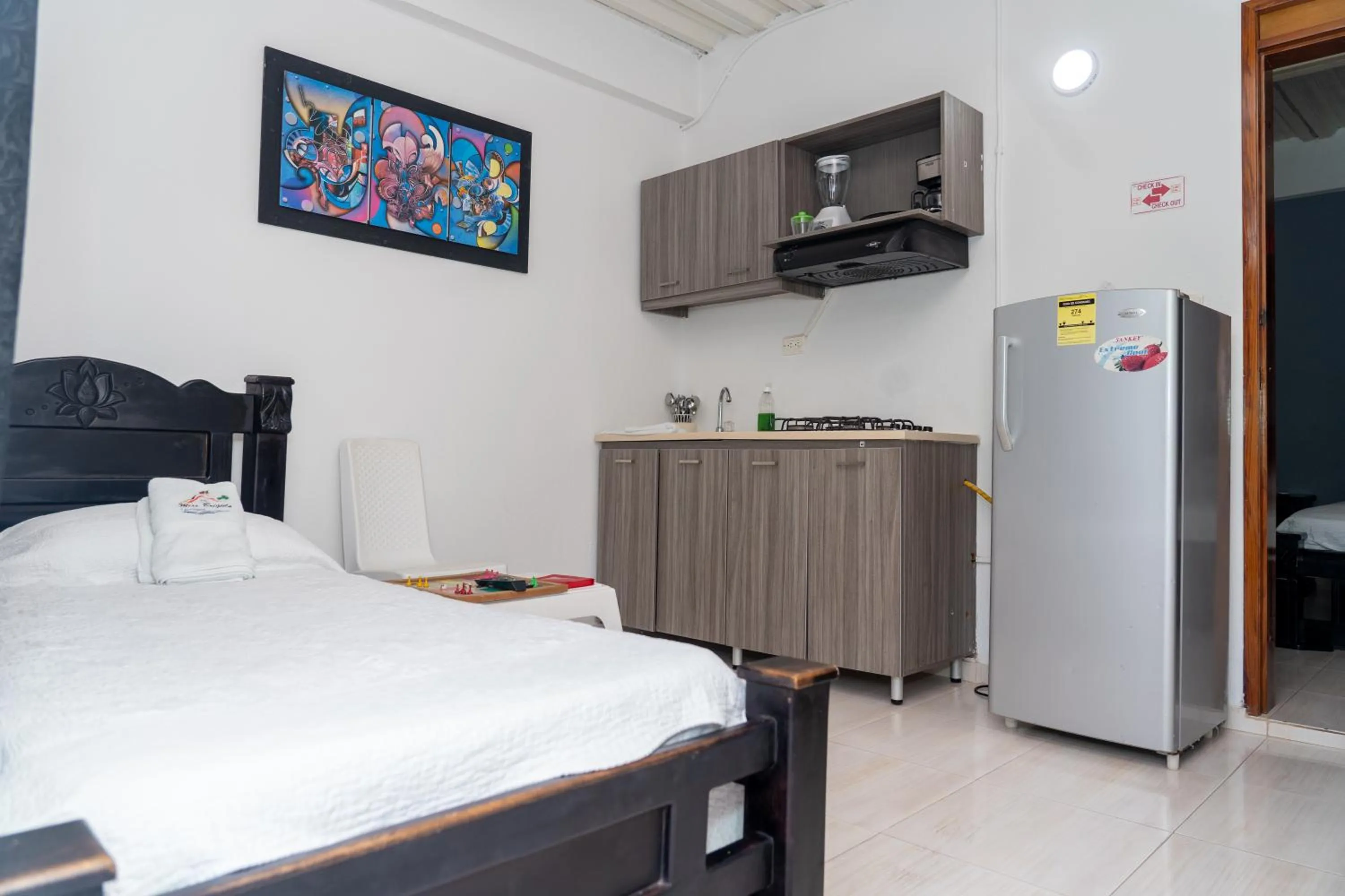 Kitchen or kitchenette, Bed in Apartamento Miss Brigida