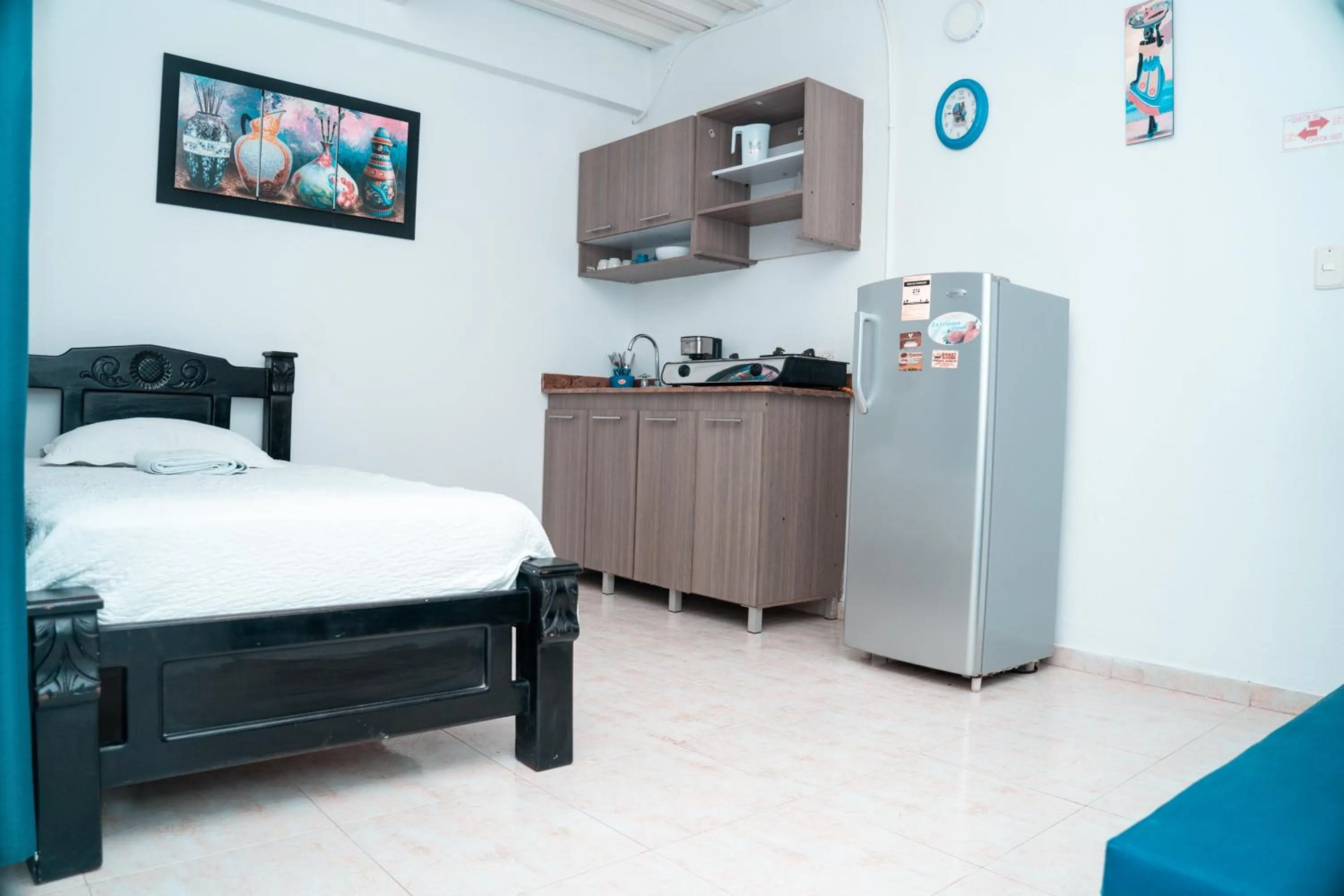 Kitchen or kitchenette, Bed in Apartamento Miss Brigida