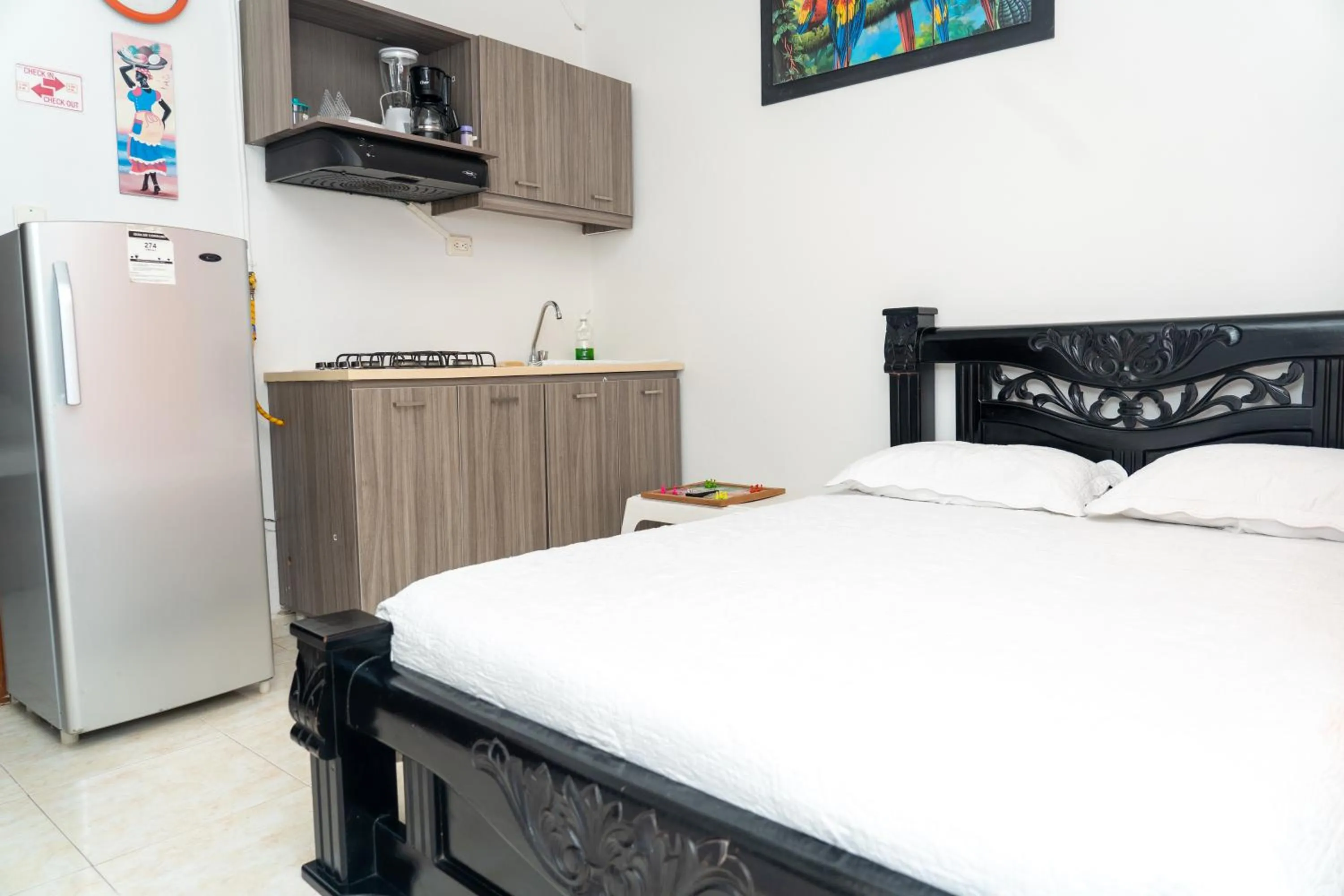 Kitchen or kitchenette, Bed in Apartamento Miss Brigida