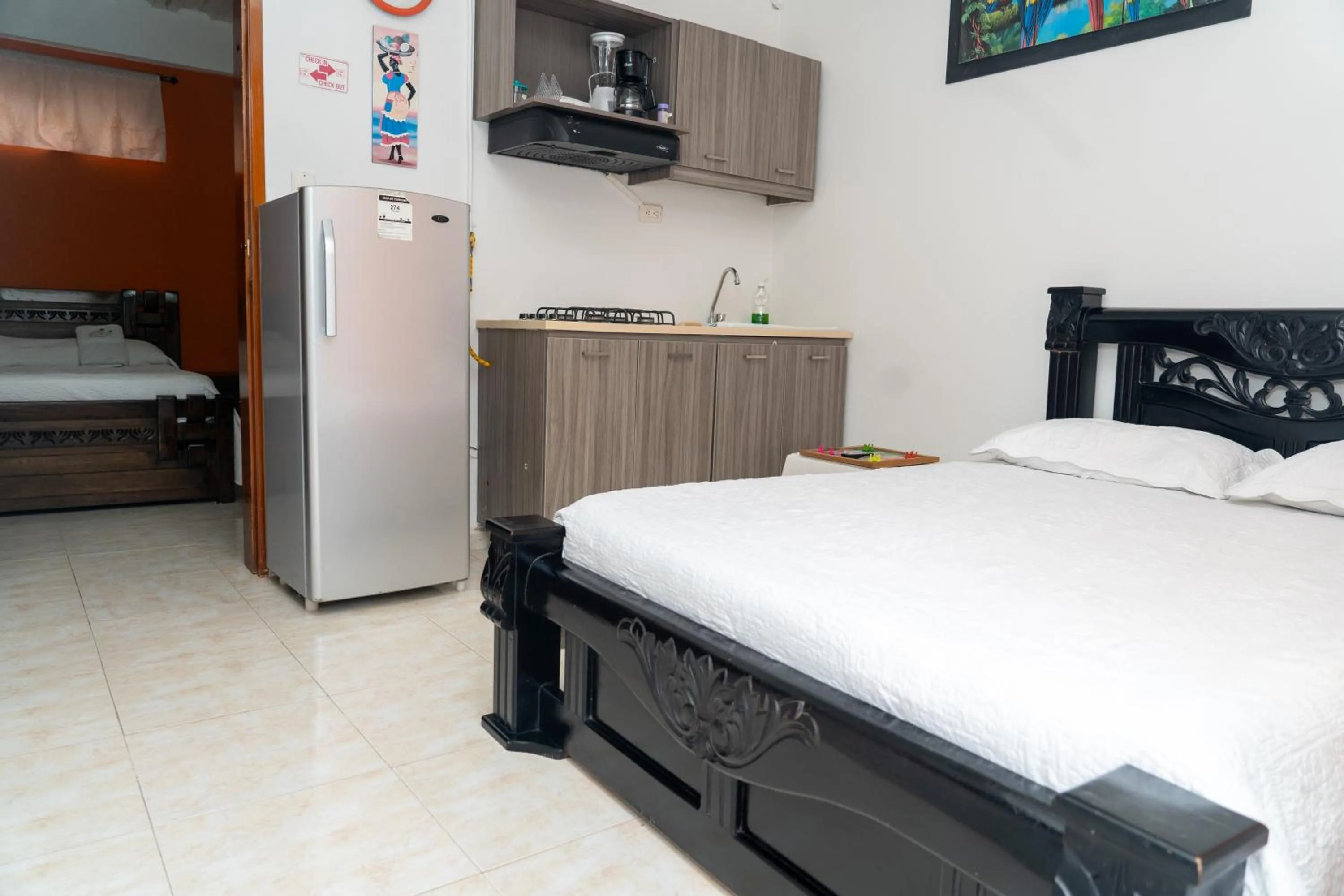 Kitchen or kitchenette, Bed in Apartamento Miss Brigida