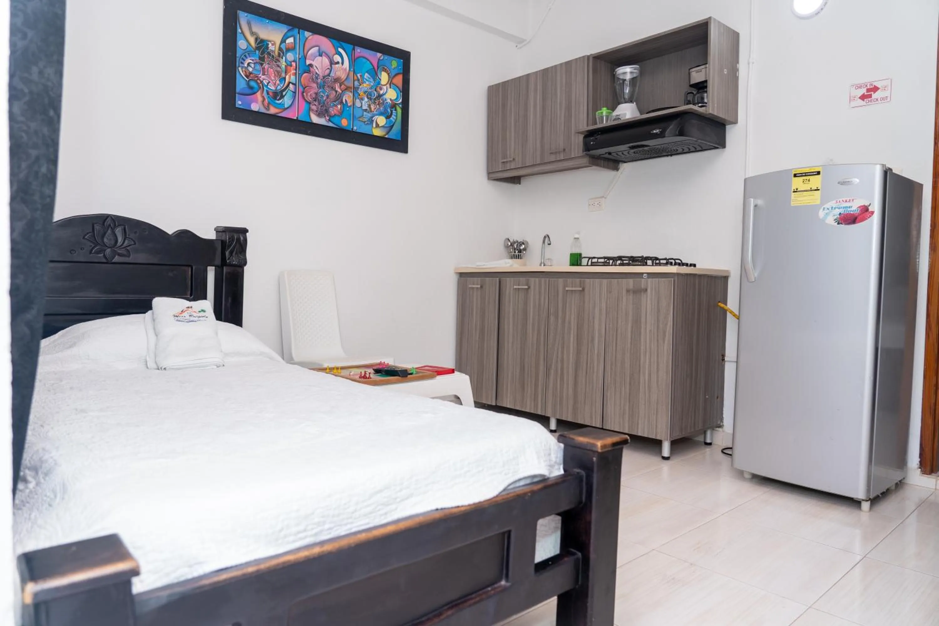 Kitchen or kitchenette, Bed in Apartamento Miss Brigida