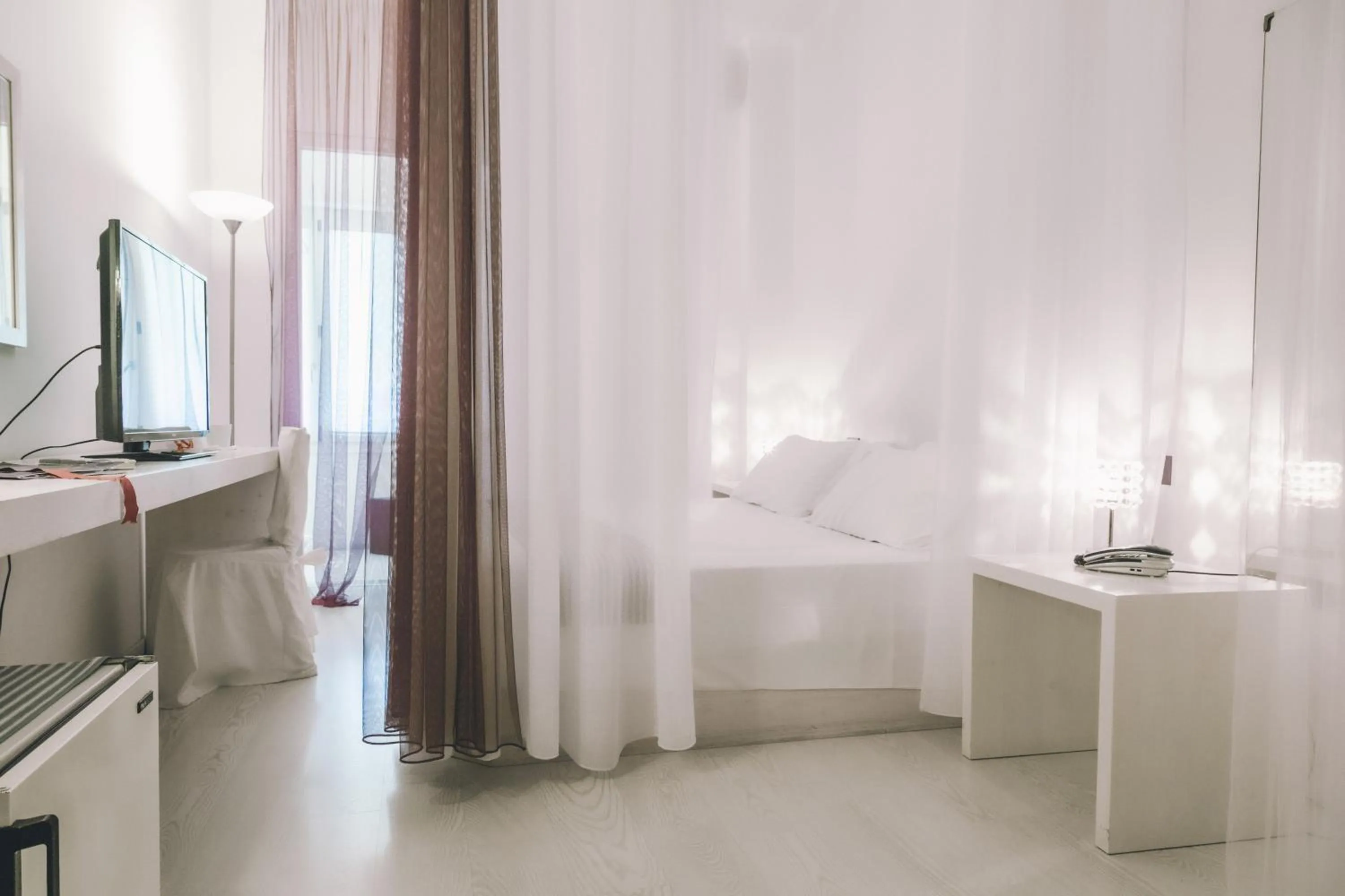 Bedroom, Bed in Eveline Portosole Hotel